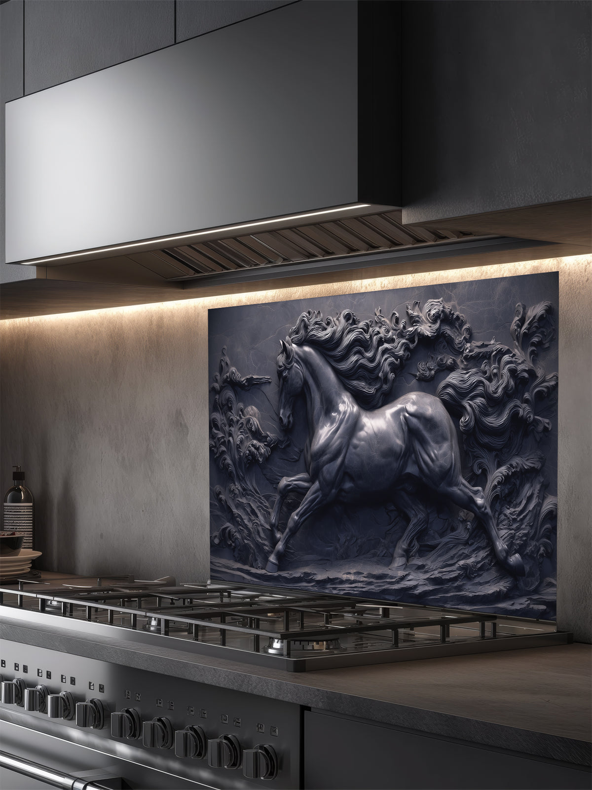 Faux 3D sculpted dark slate and black cast iron relief of a majestic galloping horse through swirling waves, UV printed on a smooth tempered glass kitchen backsplash.
