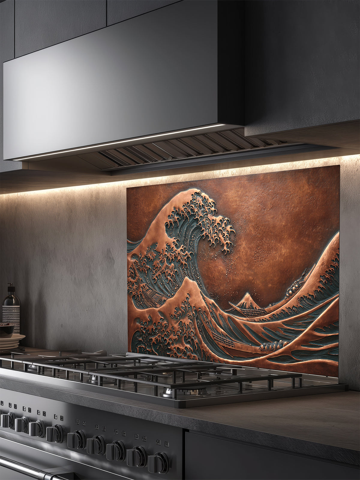 Tempered glass kitchen backsplash featuring a highly realistic 3D faux copper metal relief design of the iconic Great Wave off Kanagawa and Mount Fuji, installed behind a modern stainless steel stove.