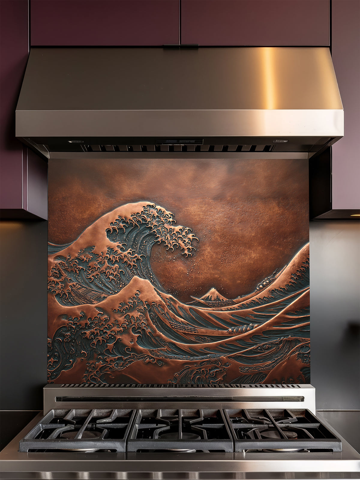 Tempered glass kitchen backsplash featuring a highly realistic 3D faux copper metal relief design of the iconic Great Wave off Kanagawa and Mount Fuji, installed behind a modern stainless steel stove.