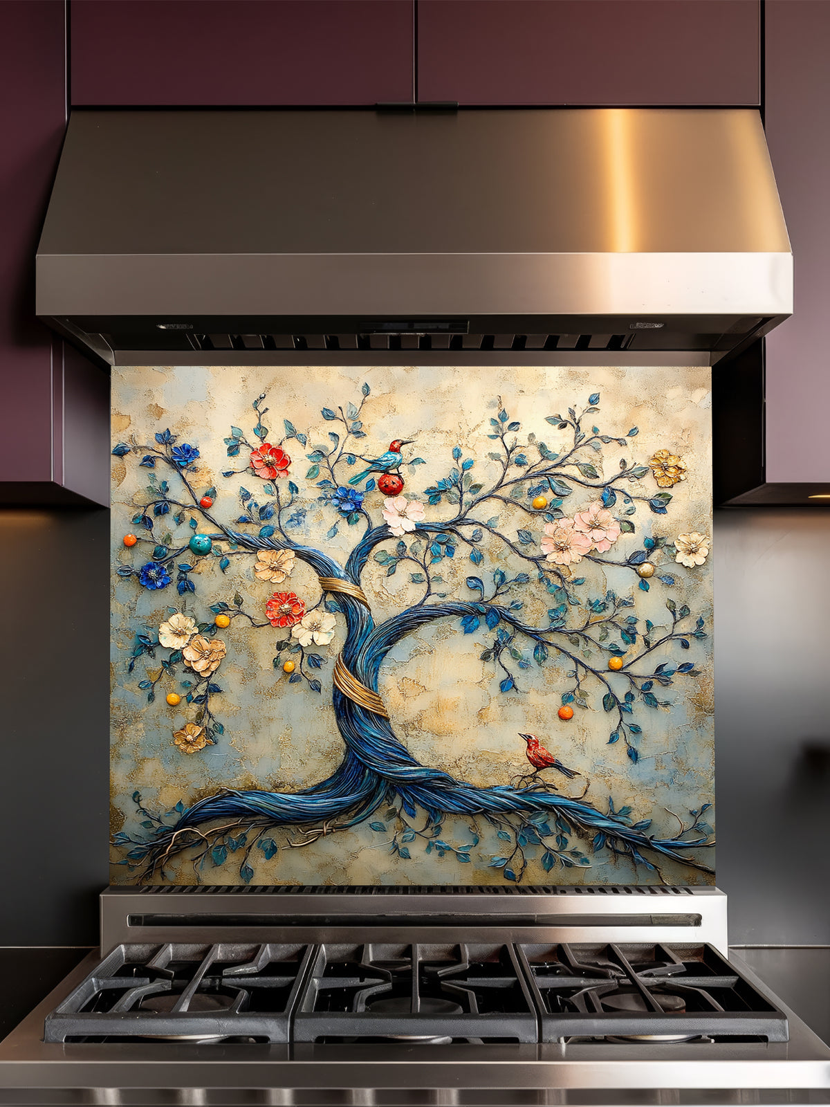 Tempered glass kitchen backsplash featuring a highly realistic 3D illusion of an embossed bas-relief sculpture showing an enchanted tree with a twisting blue trunk, colorful blooming flowers, and perched birds against a textured vintage golden-beige background, installed behind a modern black stove.