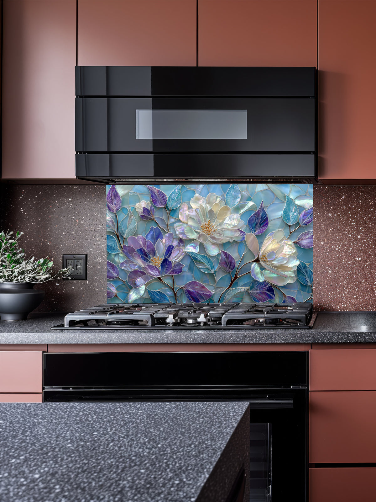 Tempered glass kitchen backsplash featuring a highly realistic 3D illusion of stained glass and mother-of-pearl mosaic art, showing large, elegant blooming flowers in iridescent shades of pearlescent white, lavender, and purple with flowing aqua blue leaves, installed behind a modern black stove.