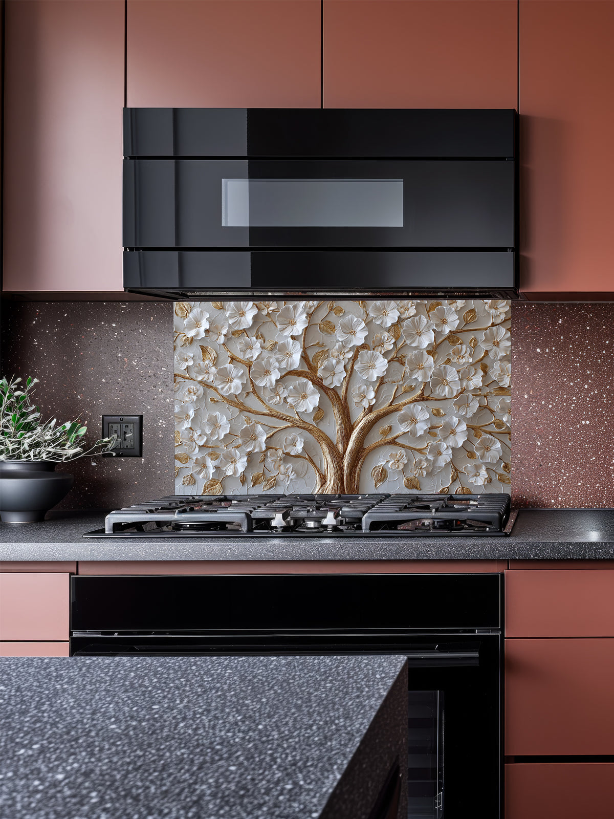 Faux 3D sculpted relief of a floral tree with pearl-white blossoms and heavy molten gold branches on a textured champagne background, UV printed on a smooth tempered glass kitchen backsplash.
