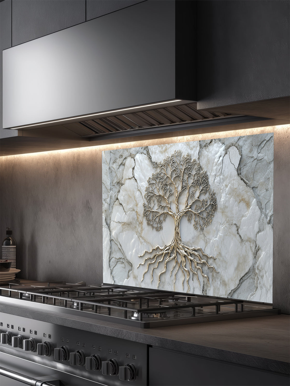 Faux 3D effect metallic Tree of Life on a light marble texture background, UV printed on a smooth tempered glass kitchen backsplash, installed behind a modern stove.