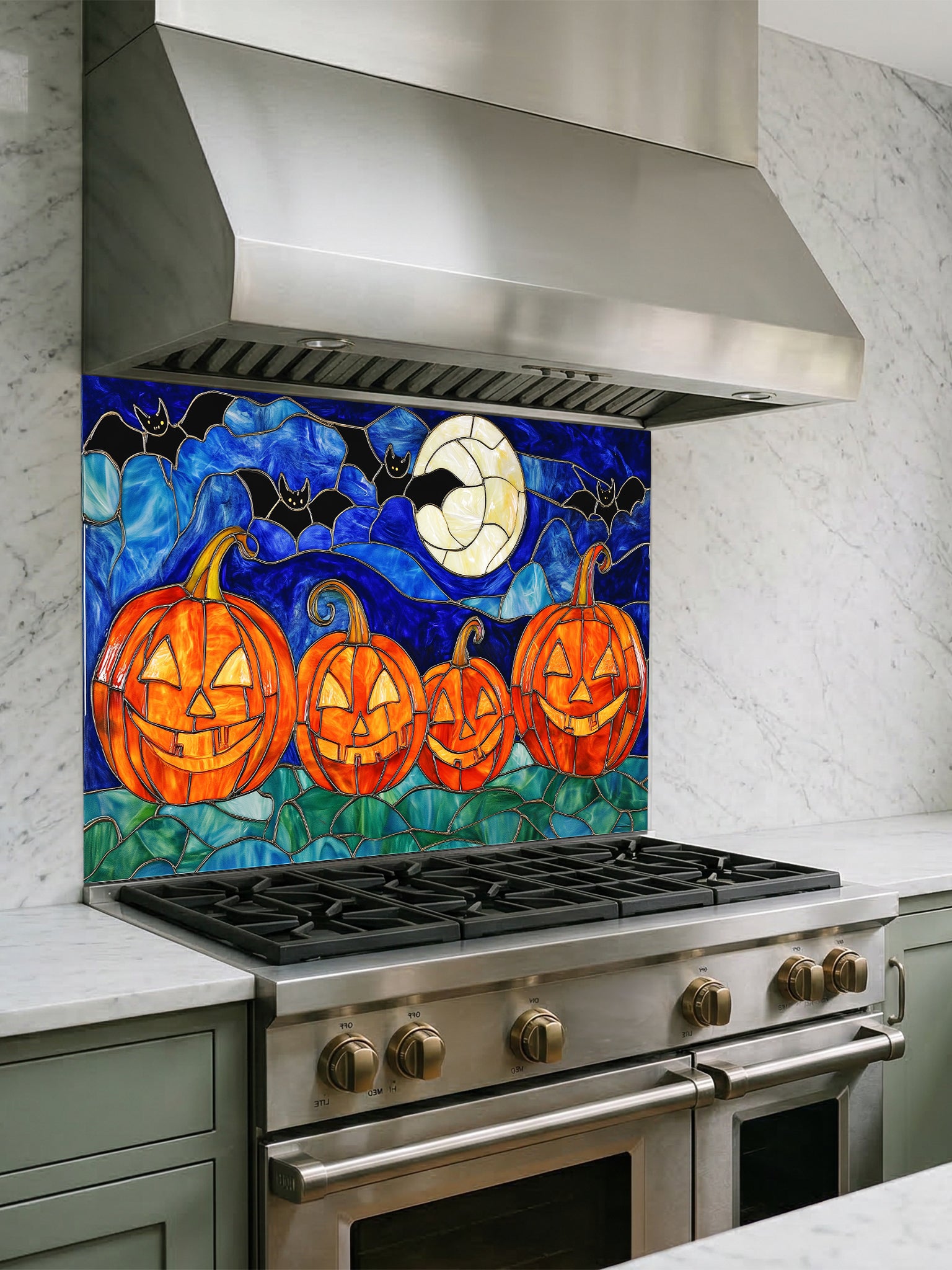 Kitchen stove with a decorative Halloween-themed backsplash featuring pumpkins and bats.