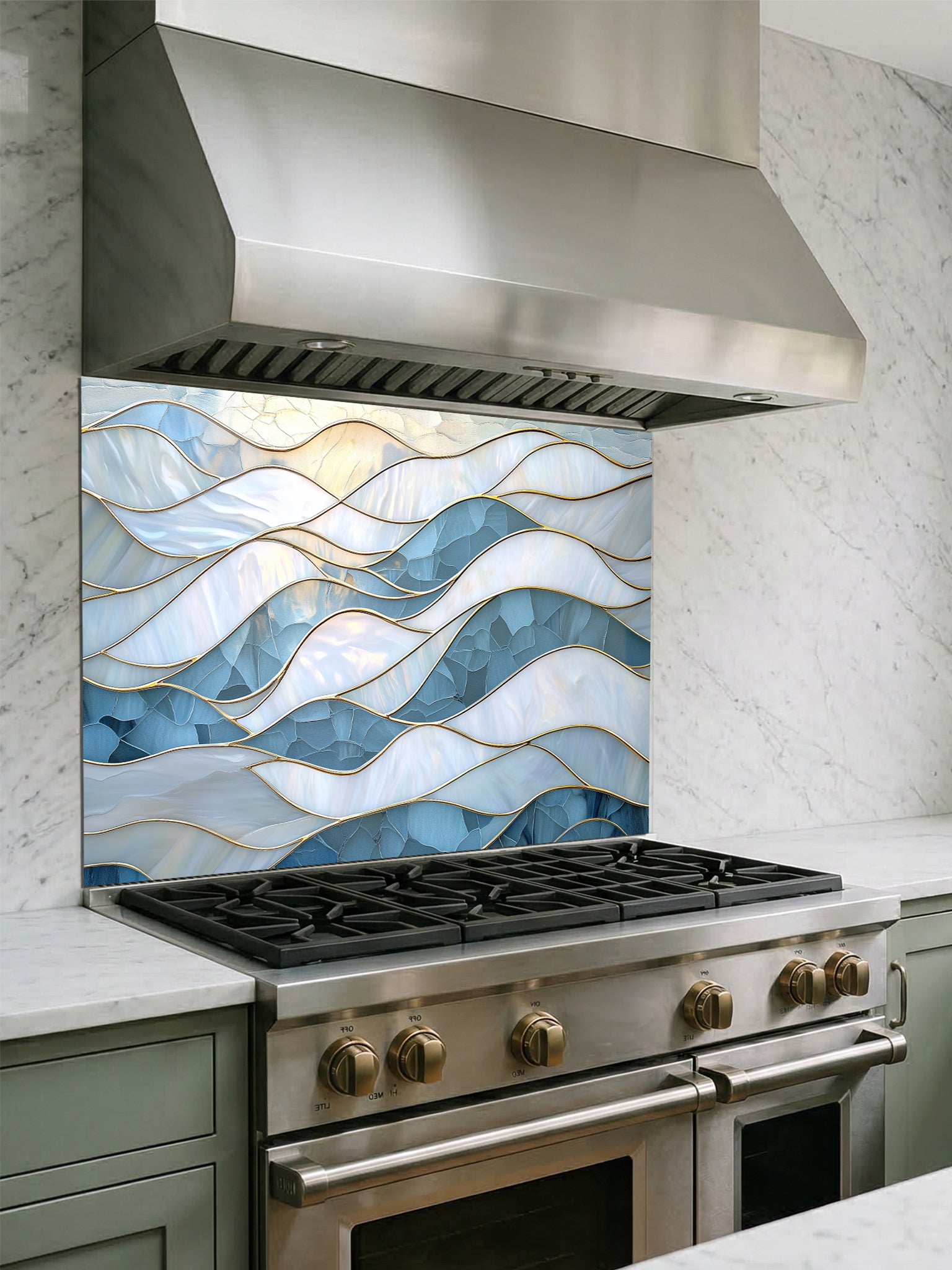 Tempered glass kitchen backsplash featuring a serene faux stained glass design of layered, flowing waves in icy blue and pearlescent white, separated by elegant gold outlines, installed behind a modern stainless steel stove.