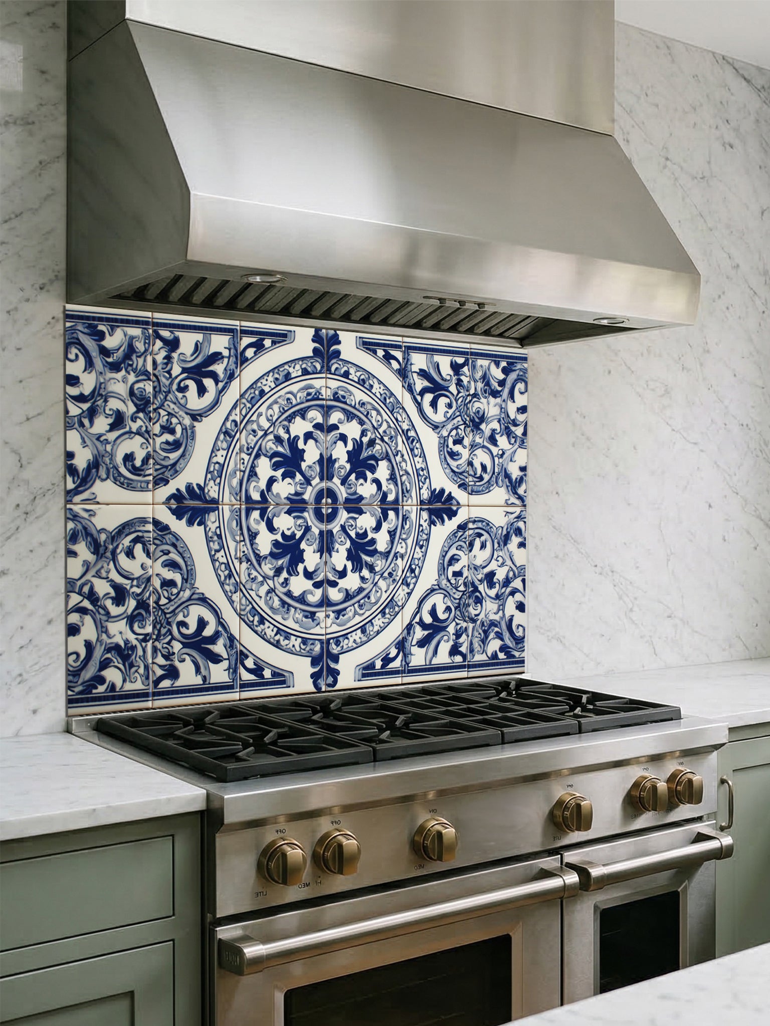 Tempered glass kitchen backsplash featuring a traditional Mediterranean blue and white Azulejo faux tile design with an ornate central floral mandala pattern, installed behind a modern stainless steel stove.