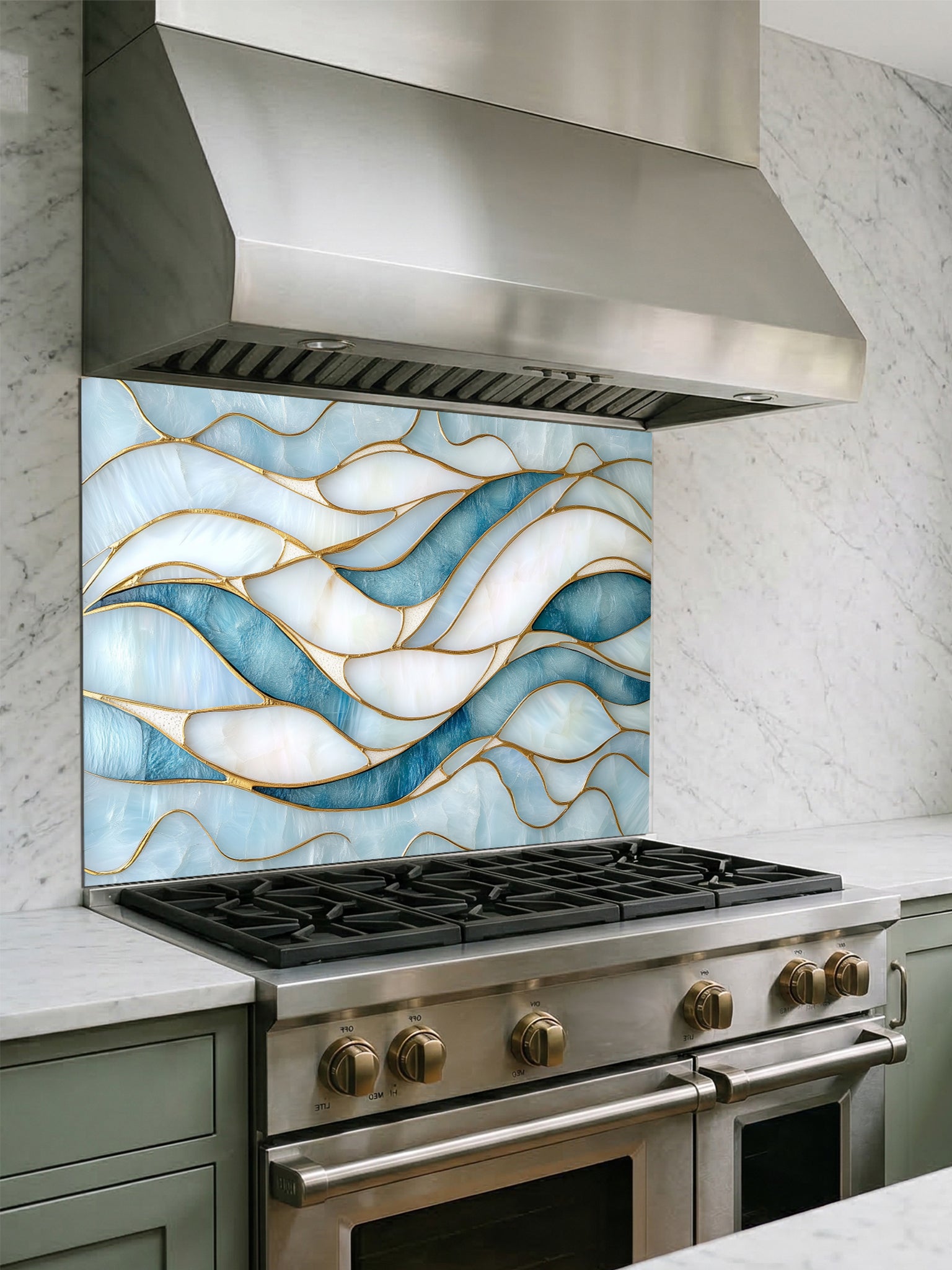 Tempered glass kitchen backsplash featuring a calming modern abstract wave design in faux stained glass with blue, teal, and pearlescent white sections separated by elegant gold lines, installed behind a modern stainless steel stove.