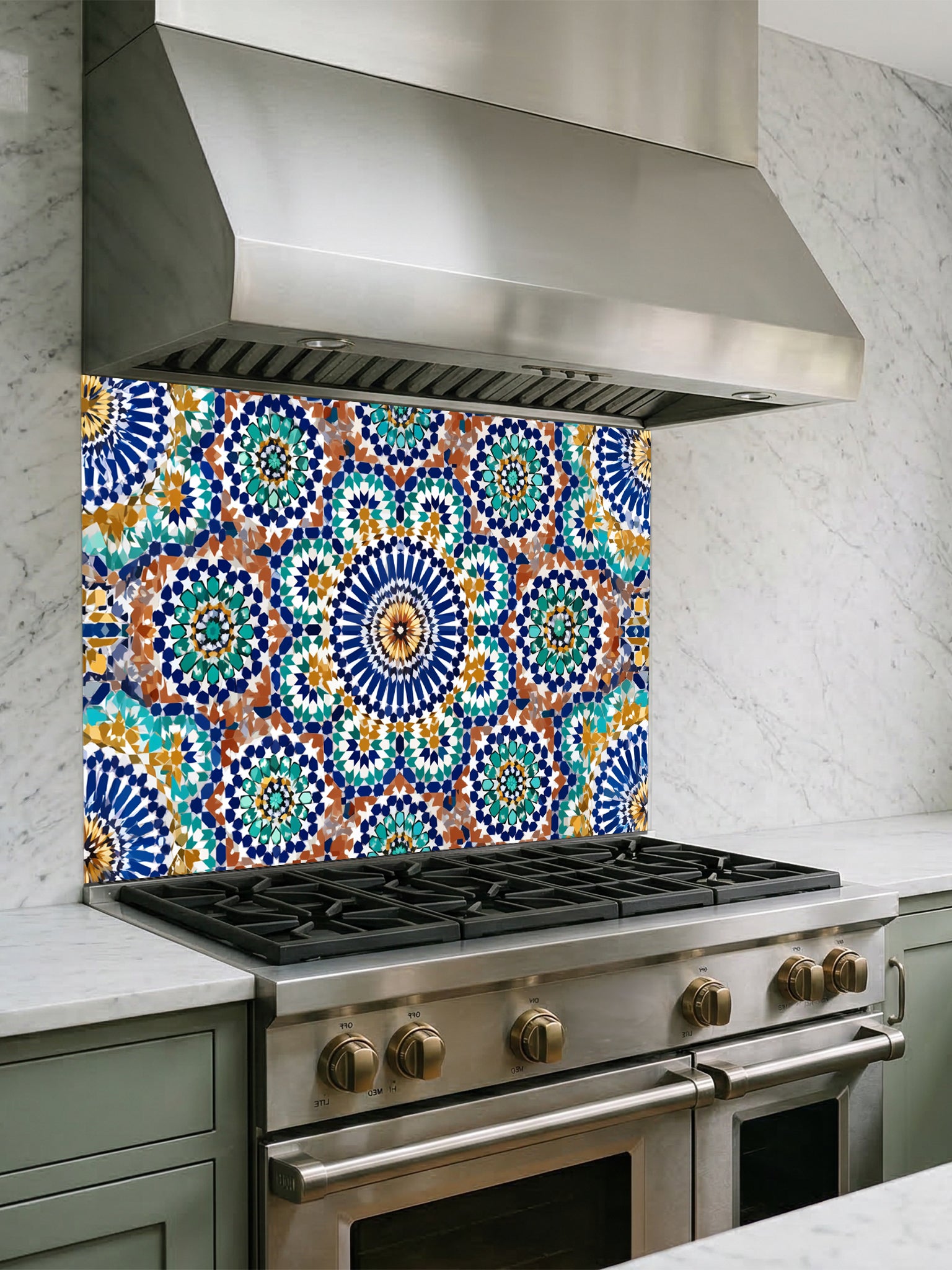 Kitchen stove with colorful tiled backsplash and stainless steel hood.