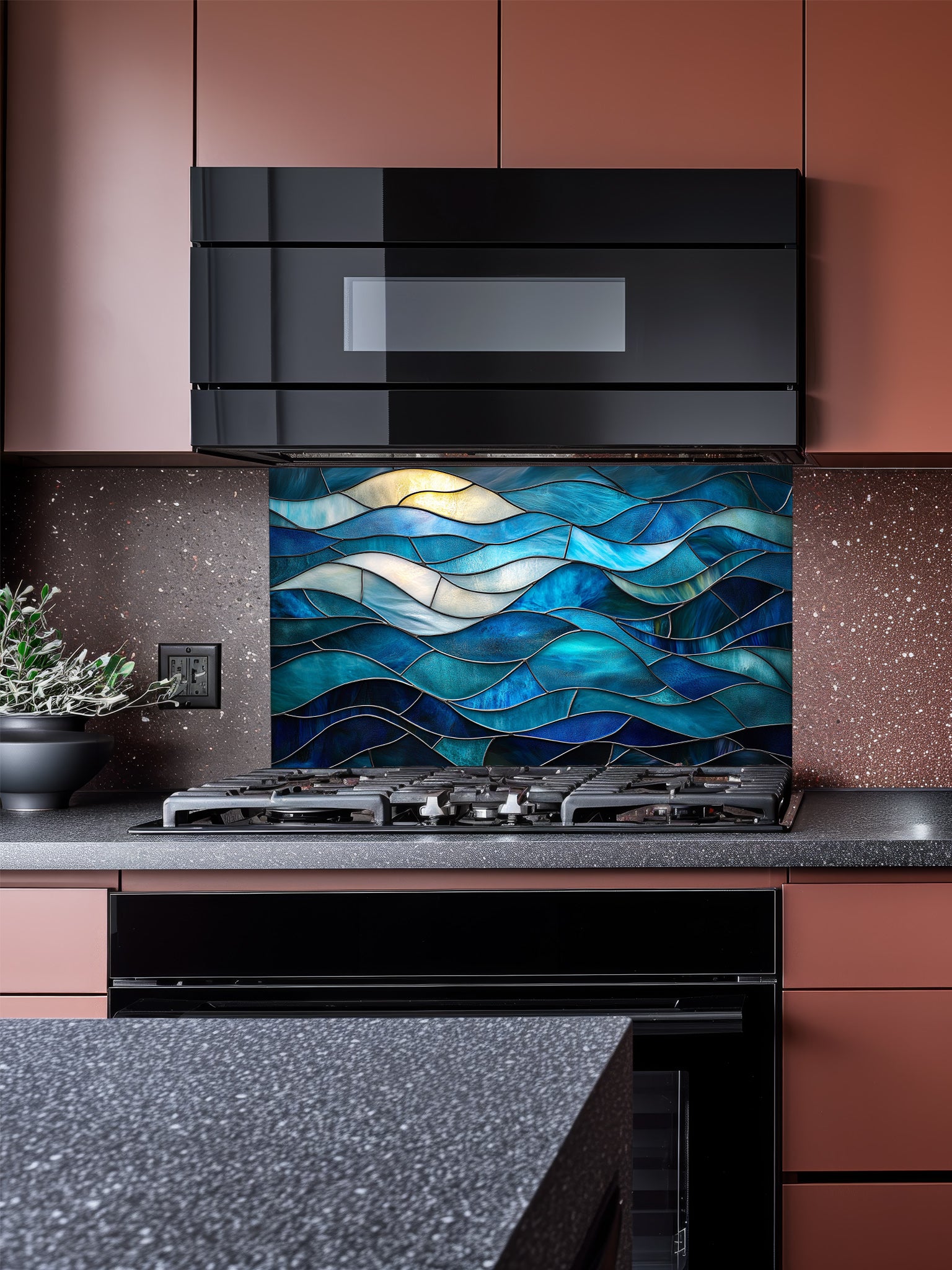 Stained glass style abstract ocean waves in rich blue and turquoise hues, UV printed on a smooth tempered glass kitchen backsplash, installed behind a modern stove.