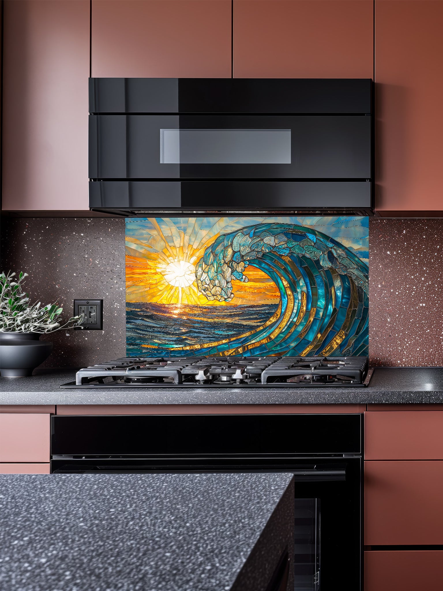 Kitchen with a decorative glass splashback featuring a wave design.