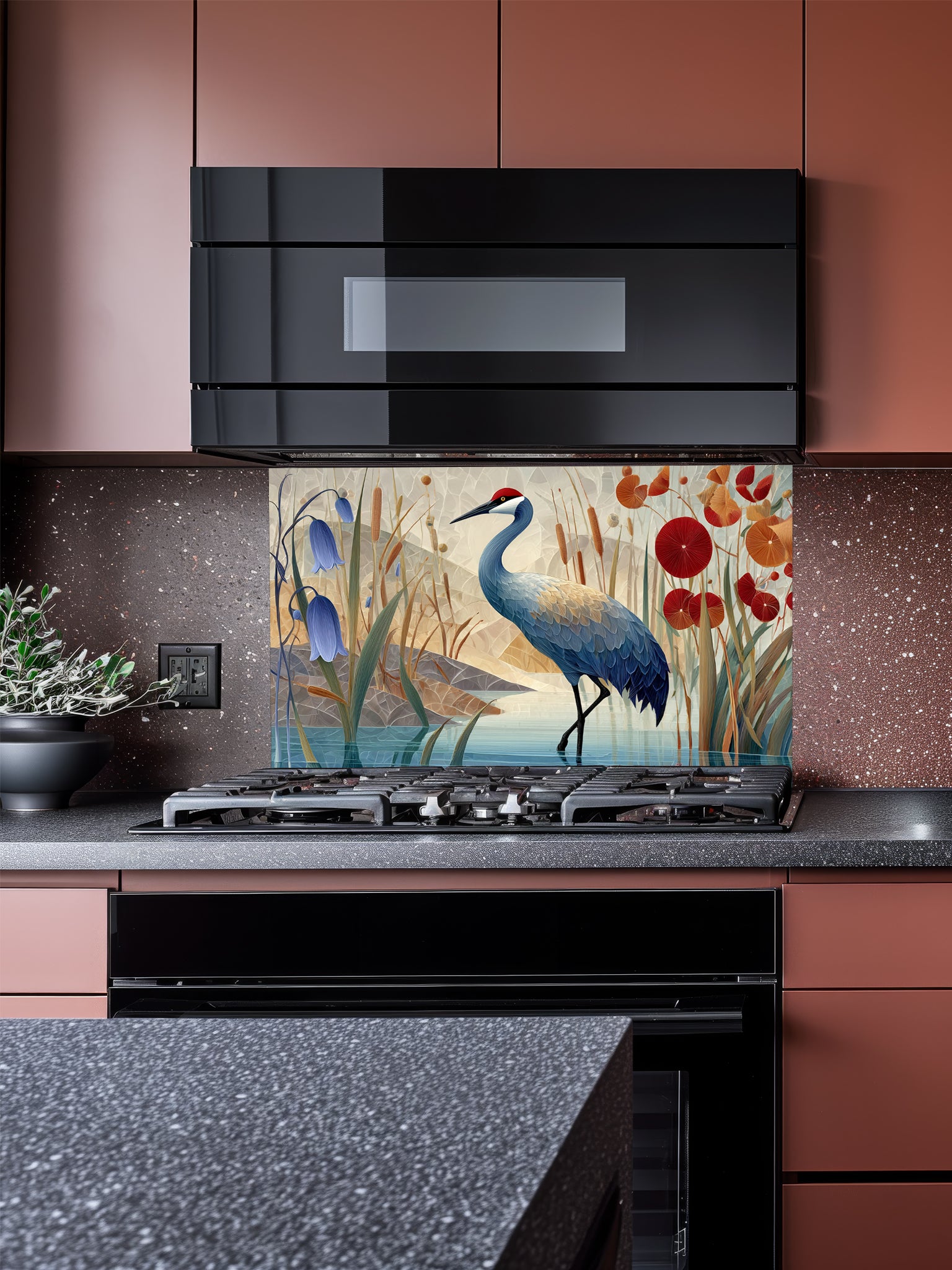 Tempered glass kitchen backsplash featuring a crisp, modern Japandi-style illustration of a majestic red-crowned crane standing in tranquil water among bluebell flowers and red botanical accents against a geometric beige mountain background, installed behind a modern black stove.