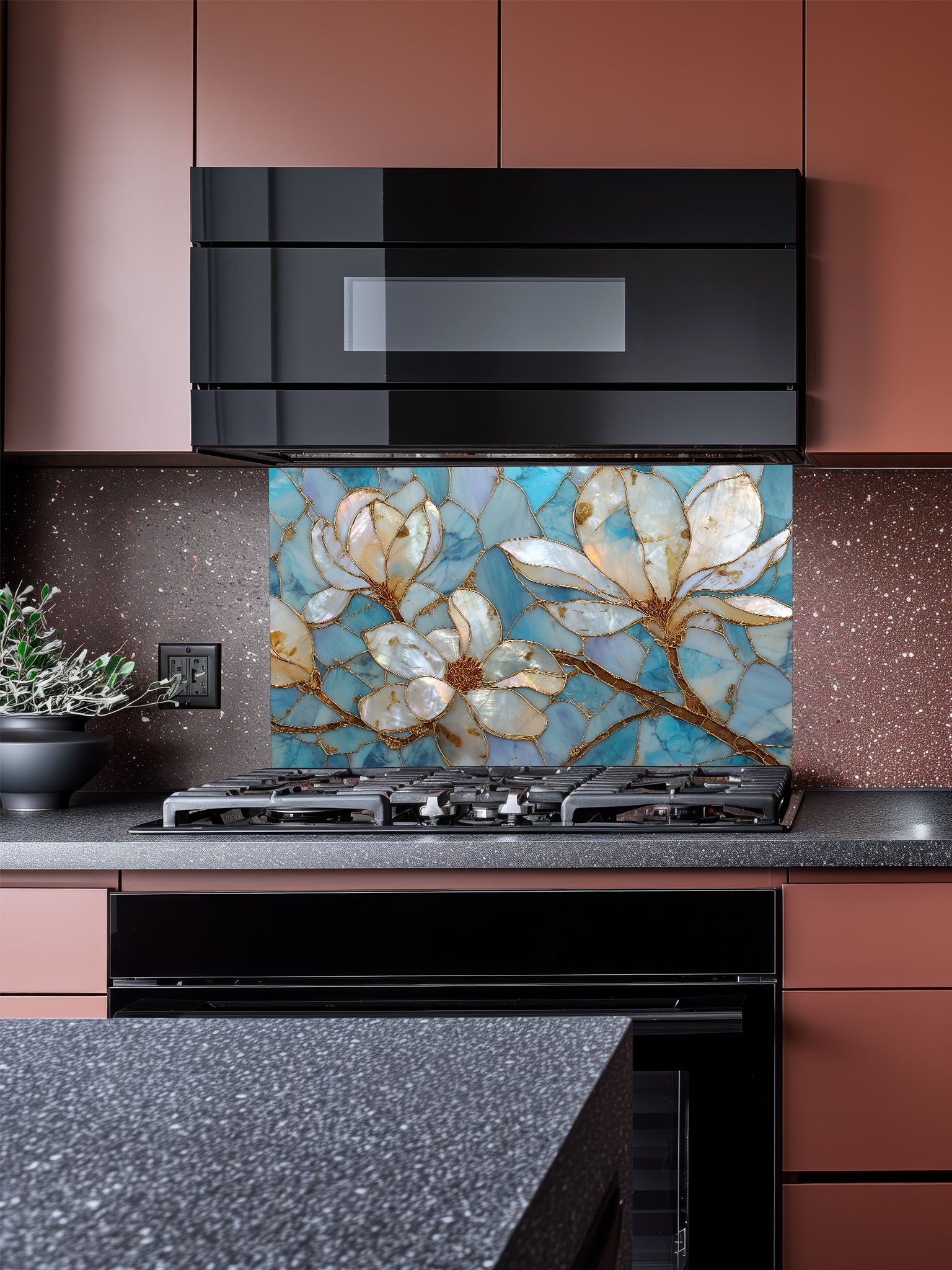 Stained glass style white magnolia flowers with gold veining on a beautiful cracked blue agate background, UV printed on a smooth tempered glass kitchen backsplash, installed behind a modern stove.