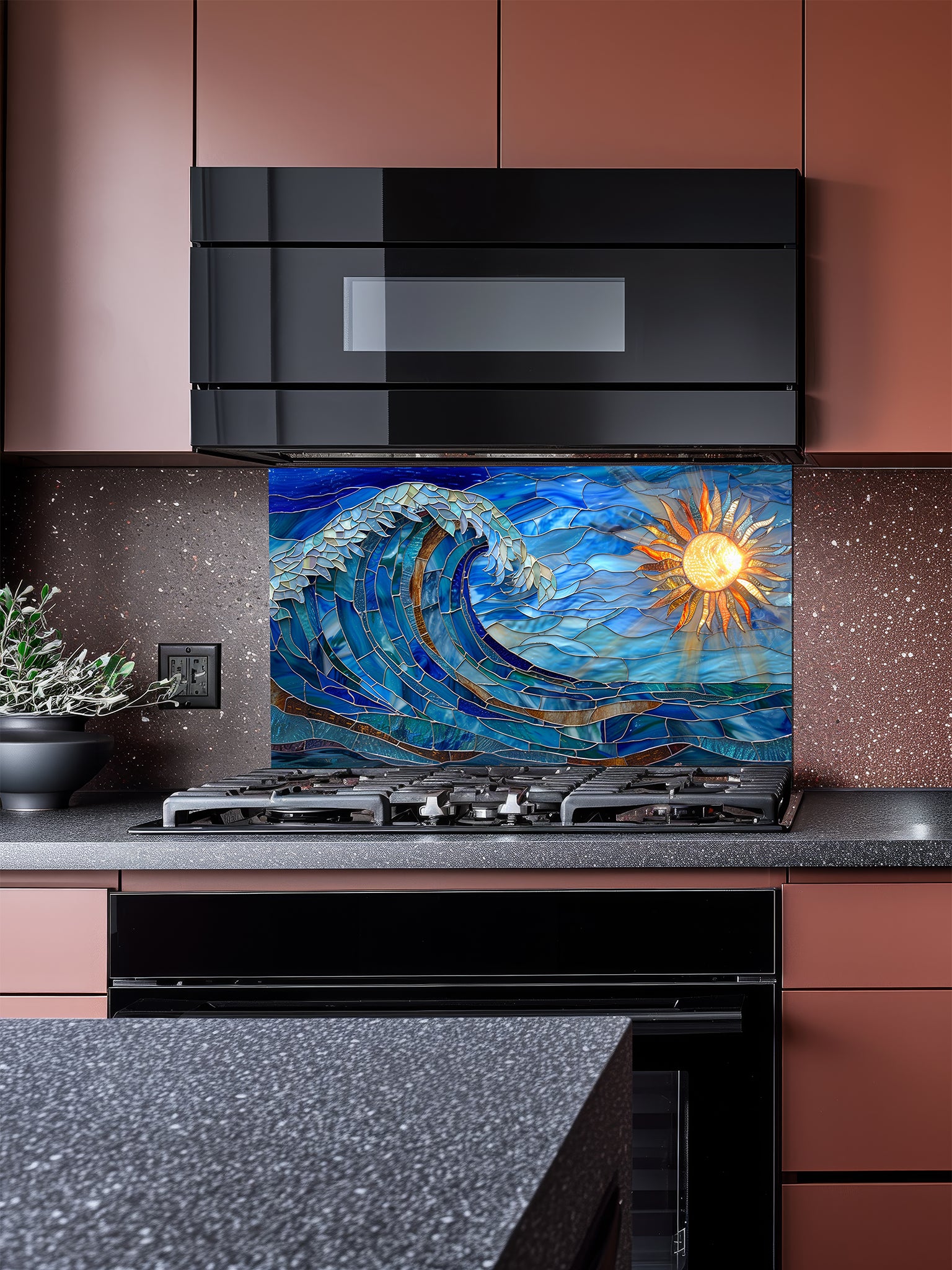 Tempered glass kitchen backsplash featuring a vibrant faux stained glass design of a dynamic crashing ocean wave in blues and teals, with a glowing golden sun and sunbeams on the right, installed behind a modern stainless steel stove.