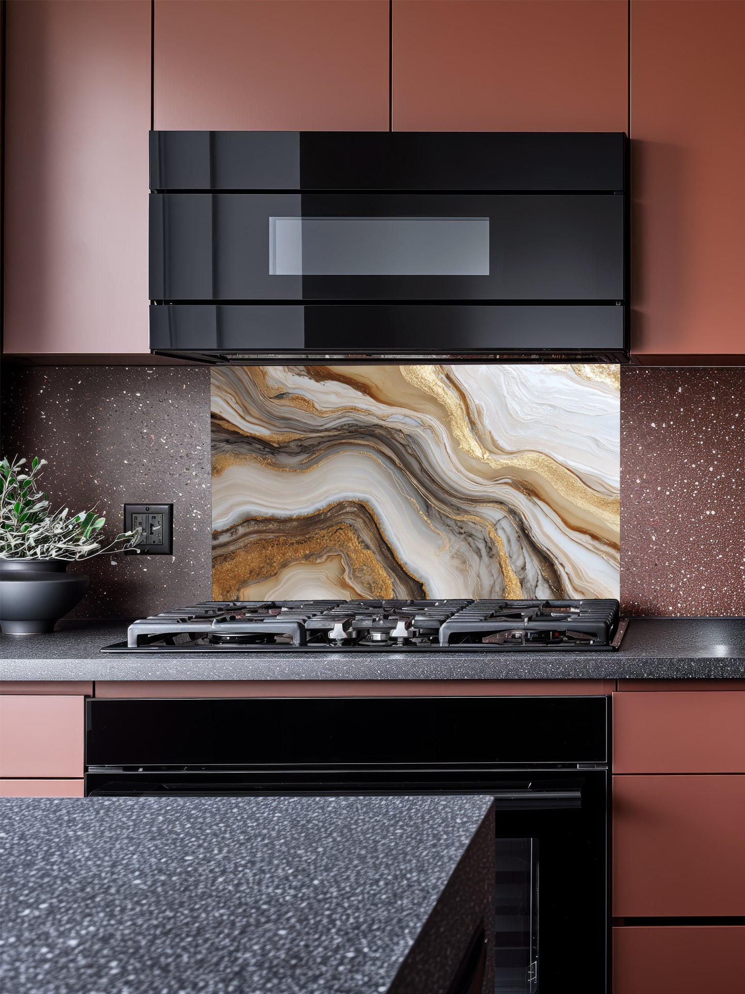 Abstract fluid art pattern mimicking white and brown agate marble with swirling gold leaf veins, UV printed on a smooth tempered glass kitchen backsplash, installed behind a modern stove.