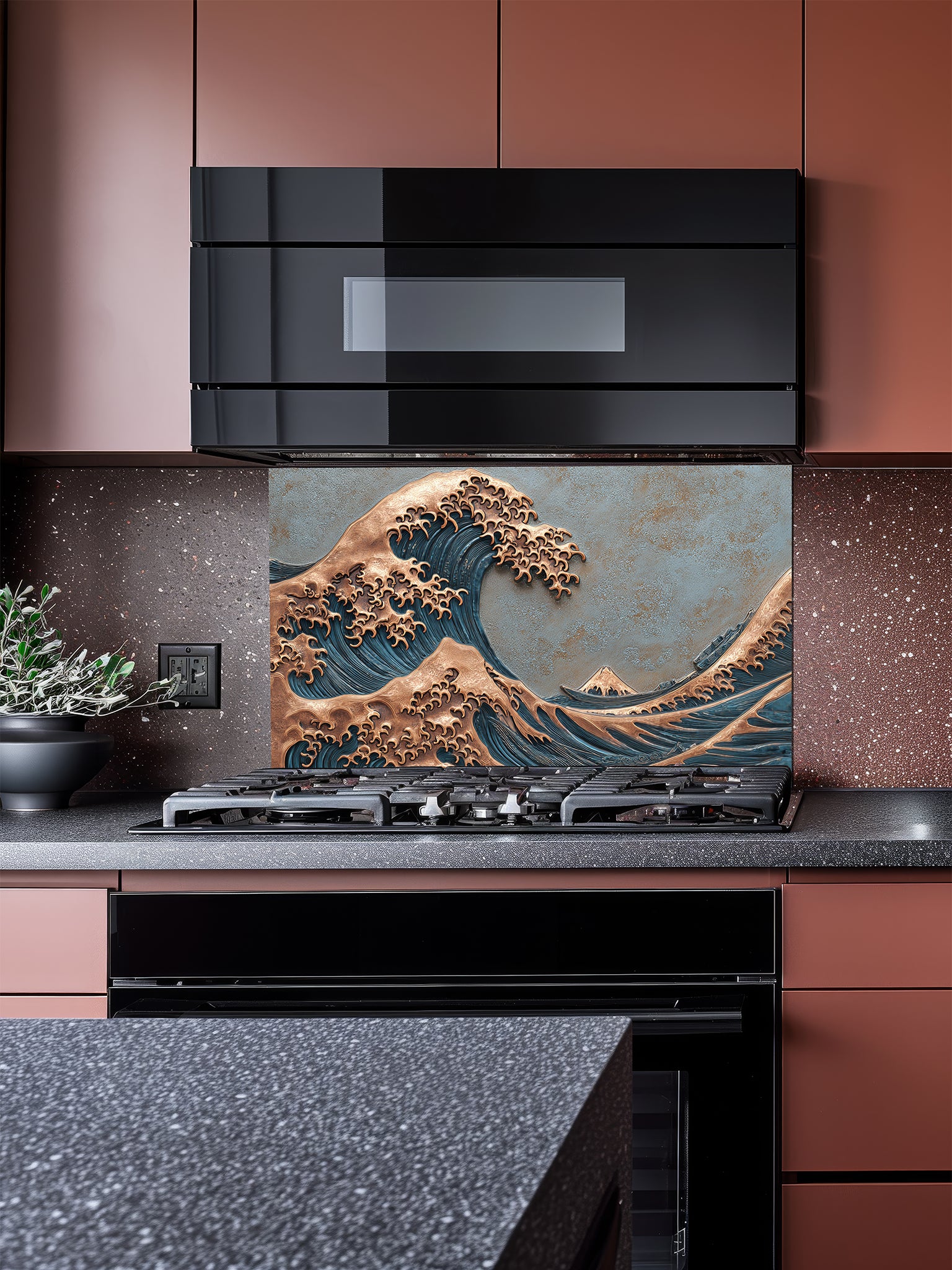Tempered glass kitchen backsplash featuring a highly realistic 3D faux metal relief design of the Great Wave off Kanagawa, showcasing a striking contrast between deep blue water textures and embossed copper wave crests, installed behind a modern stainless steel stove.