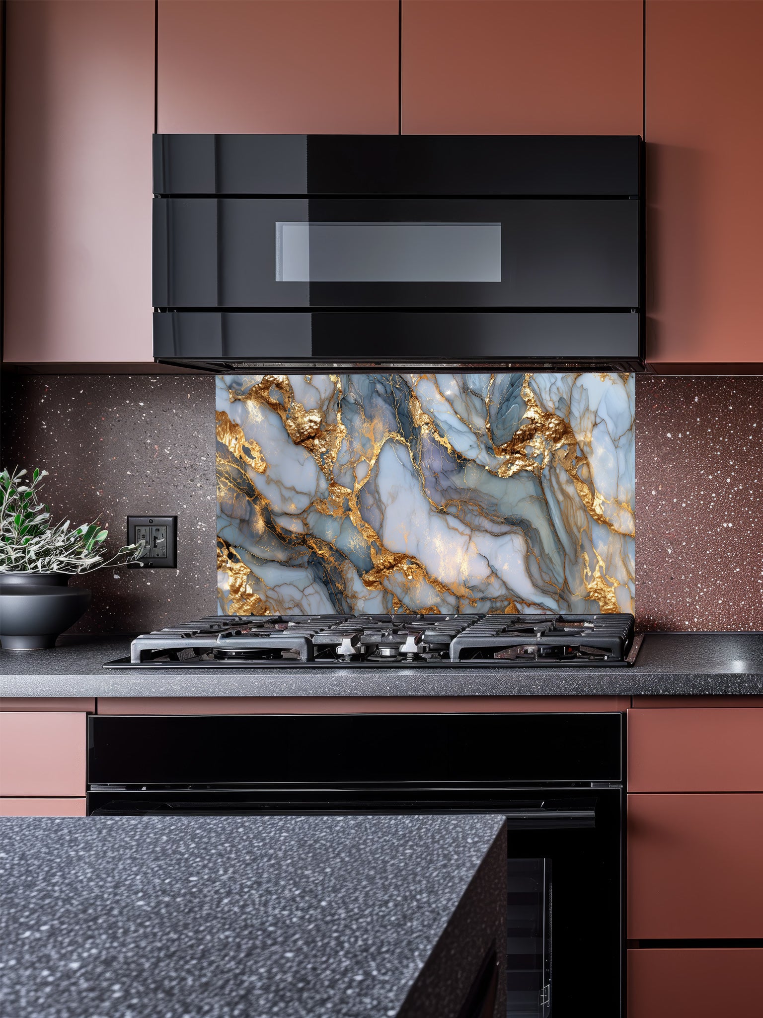 Modern kitchen with a decorative backsplash featuring gold and gray marbled pattern.