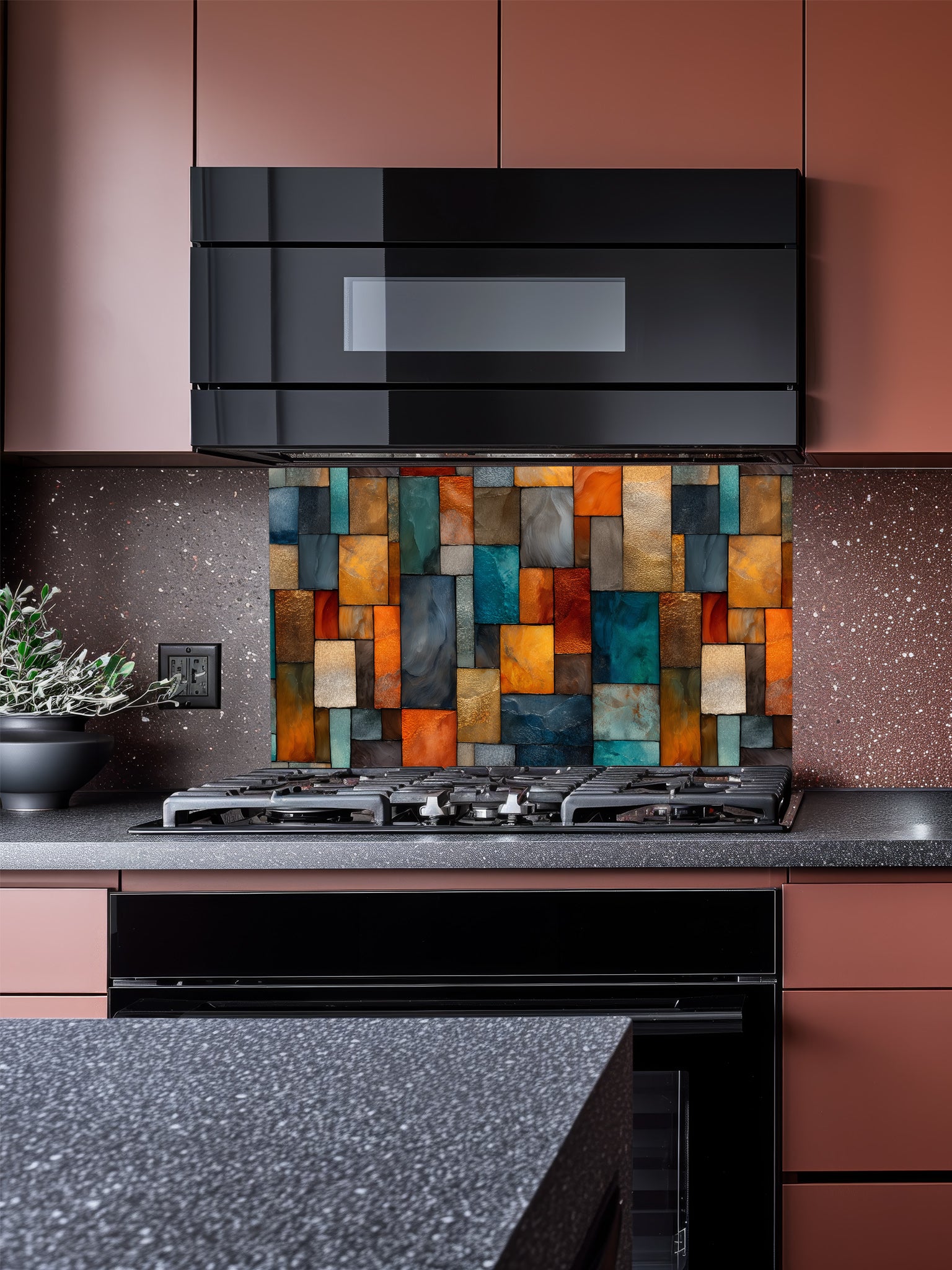 Tempered glass kitchen backsplash featuring a highly realistic 3D illusion of an abstract geometric mosaic made of textured stained glass rectangles in vibrant teal, amber, orange, and slate grey, installed behind a modern stainless steel stove.