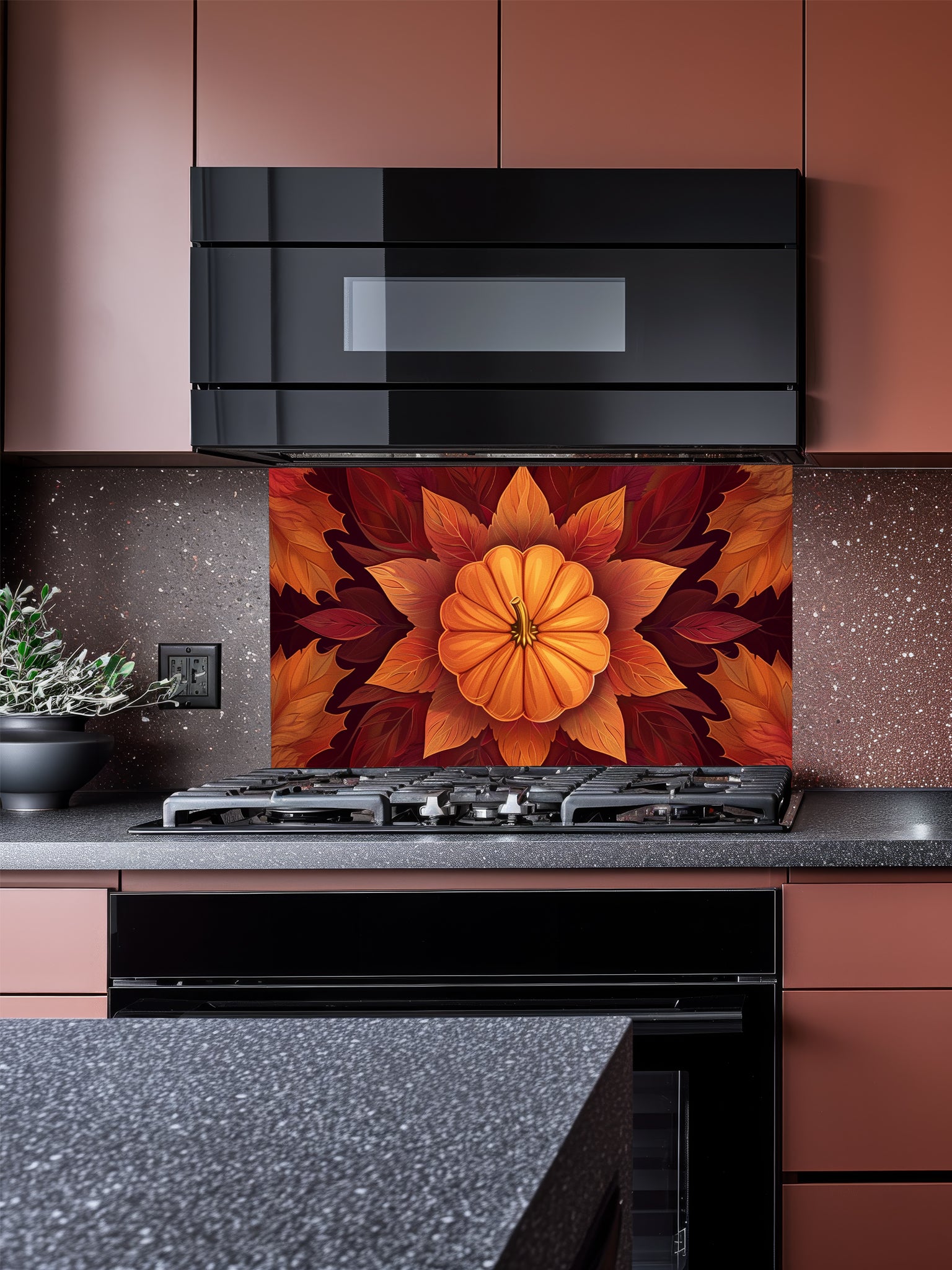 Faux 3D effect symmetrical pumpkin mandala surrounded by rich orange and burgundy autumn leaves, UV printed on a smooth tempered glass kitchen backsplash.