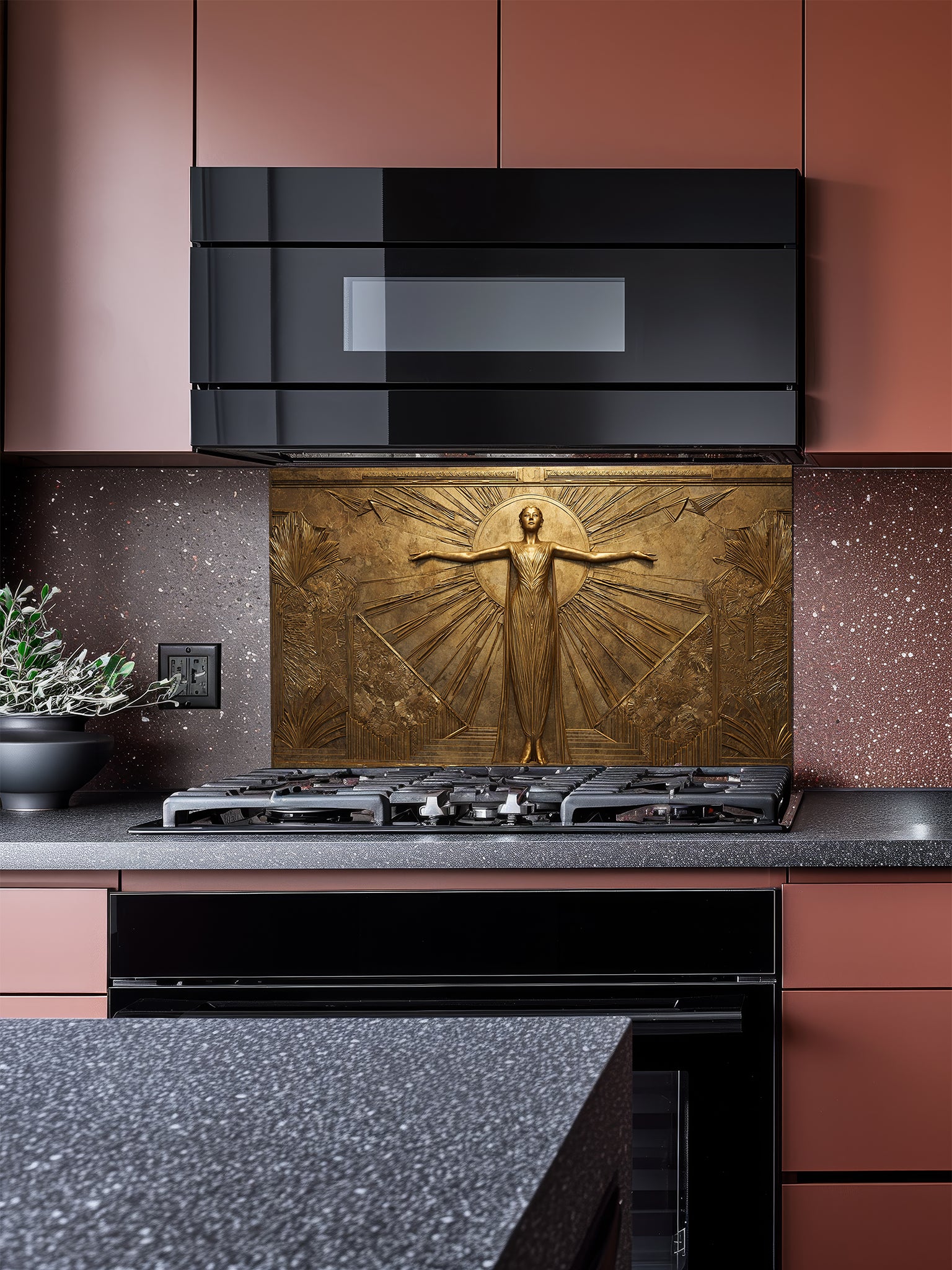 Tempered glass kitchen backsplash featuring a highly realistic 3D faux gold metal relief of a vintage Art Deco woman framed by elegant sunburst rays, installed behind a modern stainless steel stove.