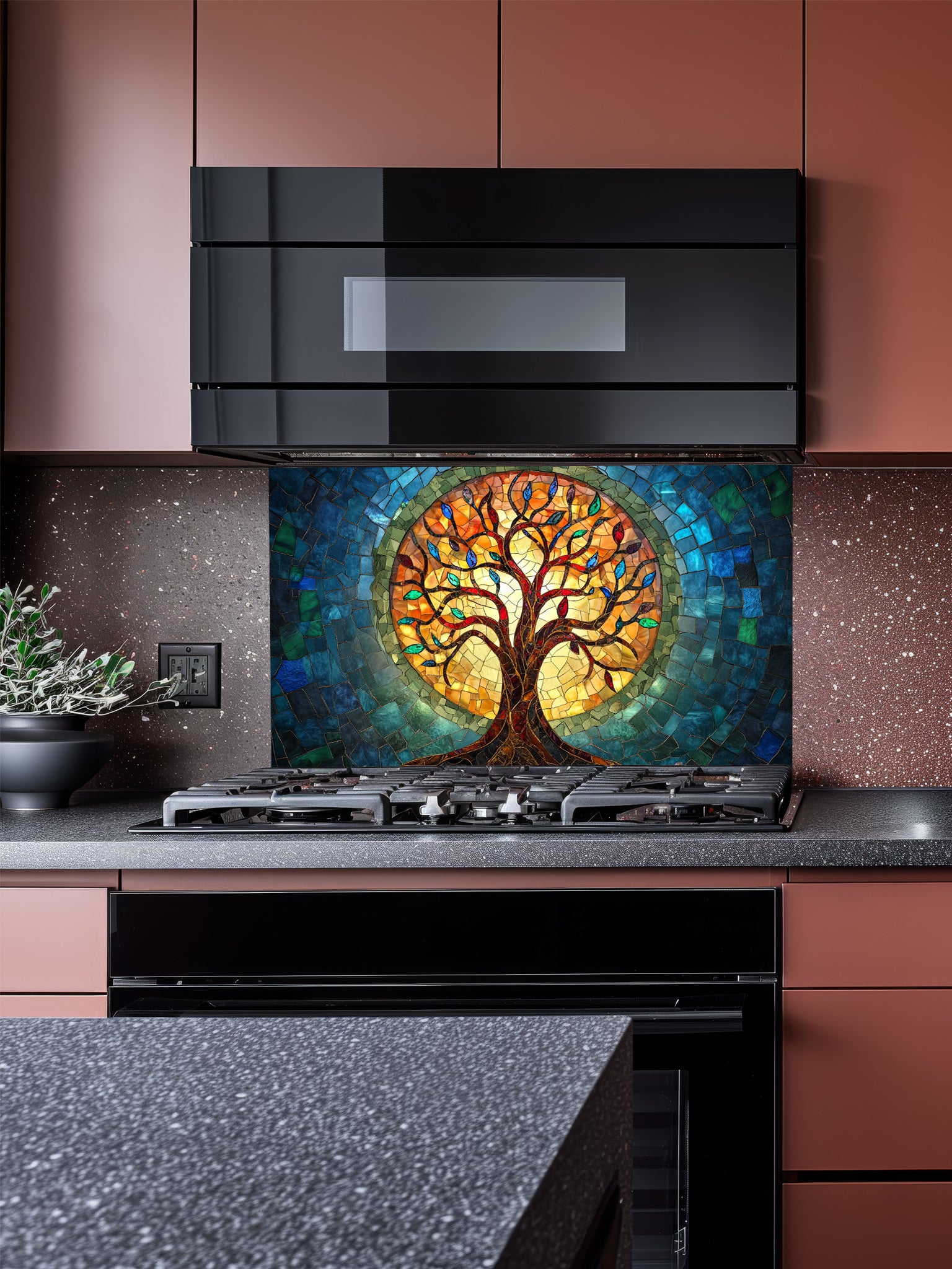 Stained glass mosaic style Tree of Life with vibrant blue, teal, and glowing amber colors, UV printed on a smooth tempered glass kitchen backsplash, installed behind a modern stove.