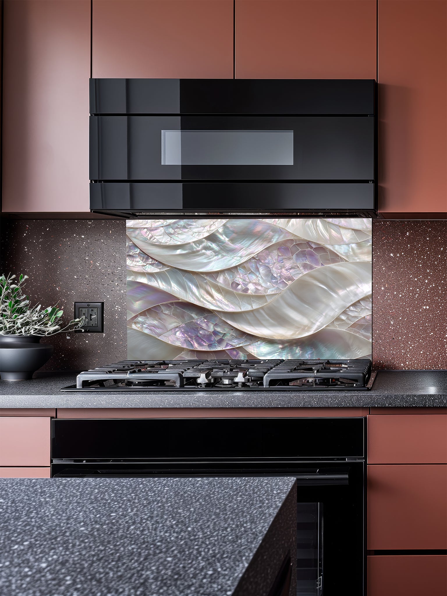 Tempered glass kitchen backsplash featuring a highly realistic 3D faux mosaic design of continuous flowing waves of mother of pearl shells with iridescent pastel colors, installed behind a modern stainless steel stove.
