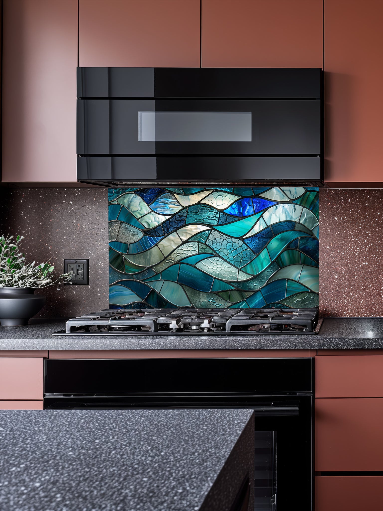 Tempered glass kitchen backsplash featuring a highly realistic 3D illusion of stained glass or sea glass art showing flowing, overlapping ocean waves in vibrant translucent shades of sapphire blue, teal, and aquamarine, installed behind a modern black stove.