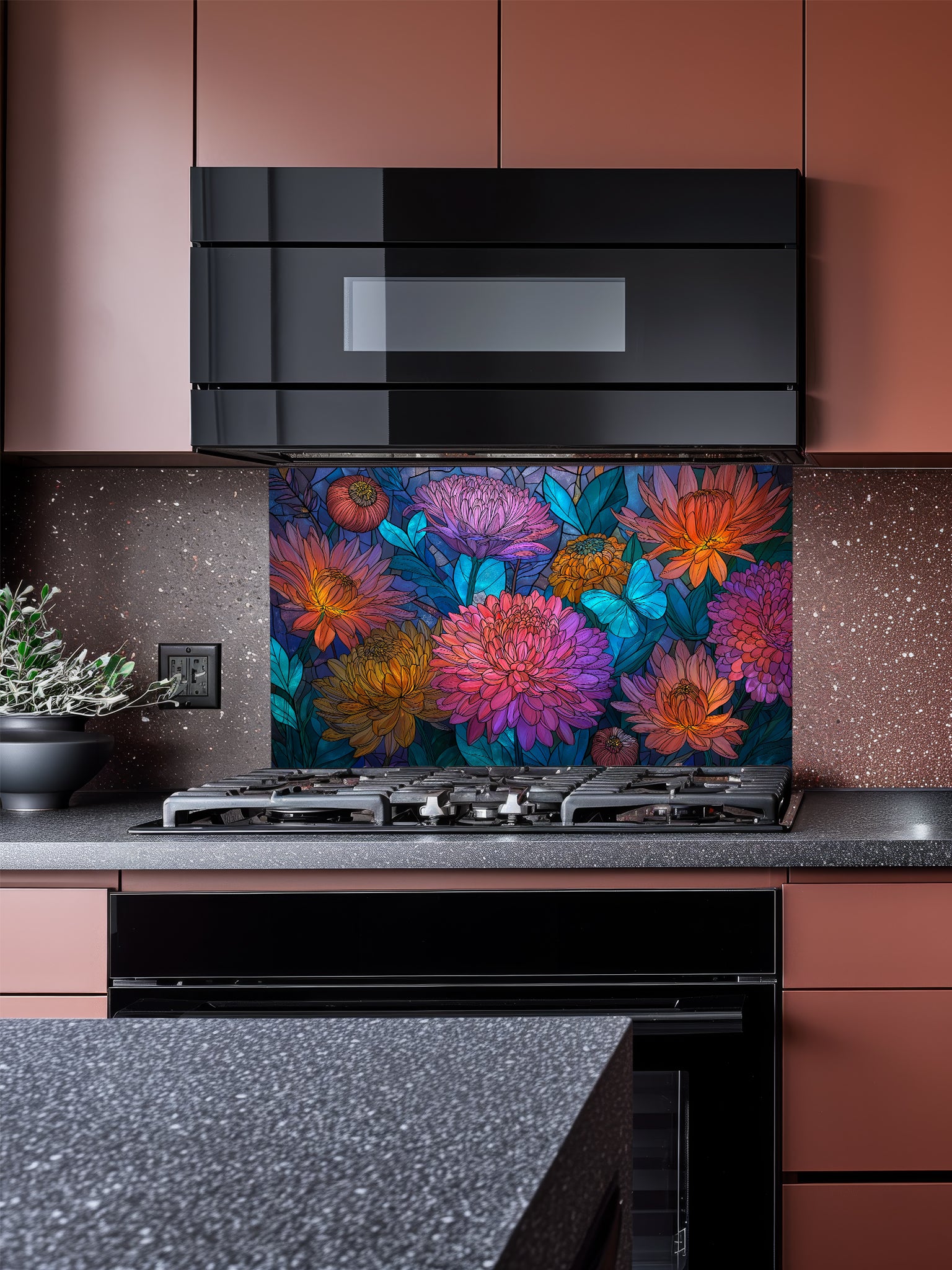 Stained glass style vibrant pink and orange dahlia flowers with a bright blue butterfly, UV printed on a smooth tempered glass kitchen backsplash, installed behind a modern stove.