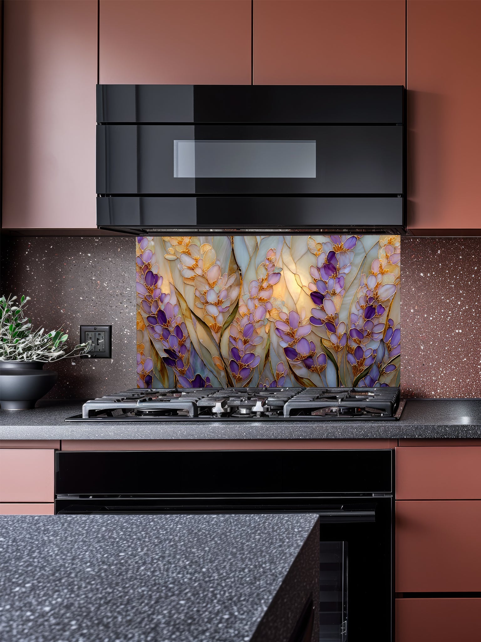 Tempered glass kitchen backsplash featuring a highly realistic 3D illusion of Art Nouveau stained glass art showing elegant, sweeping clusters of purple lavender and lilac blossoms with green leaves outlined in gold against a warm amber background, installed behind a modern black stove.