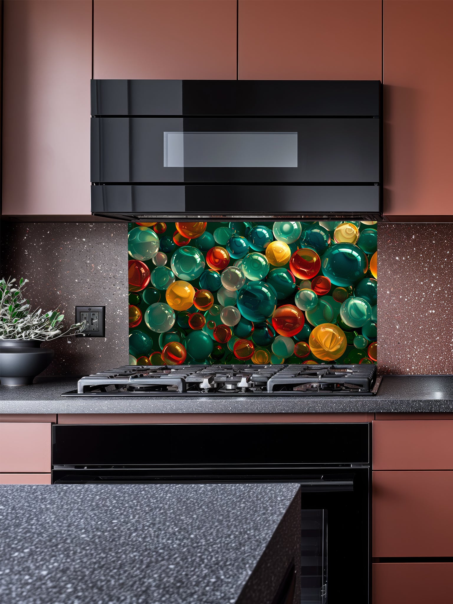 Faux 3D effect colorful translucent glass orbs and bubbles in jewel tones, UV printed on a smooth tempered glass kitchen backsplash, installed behind a modern stove.