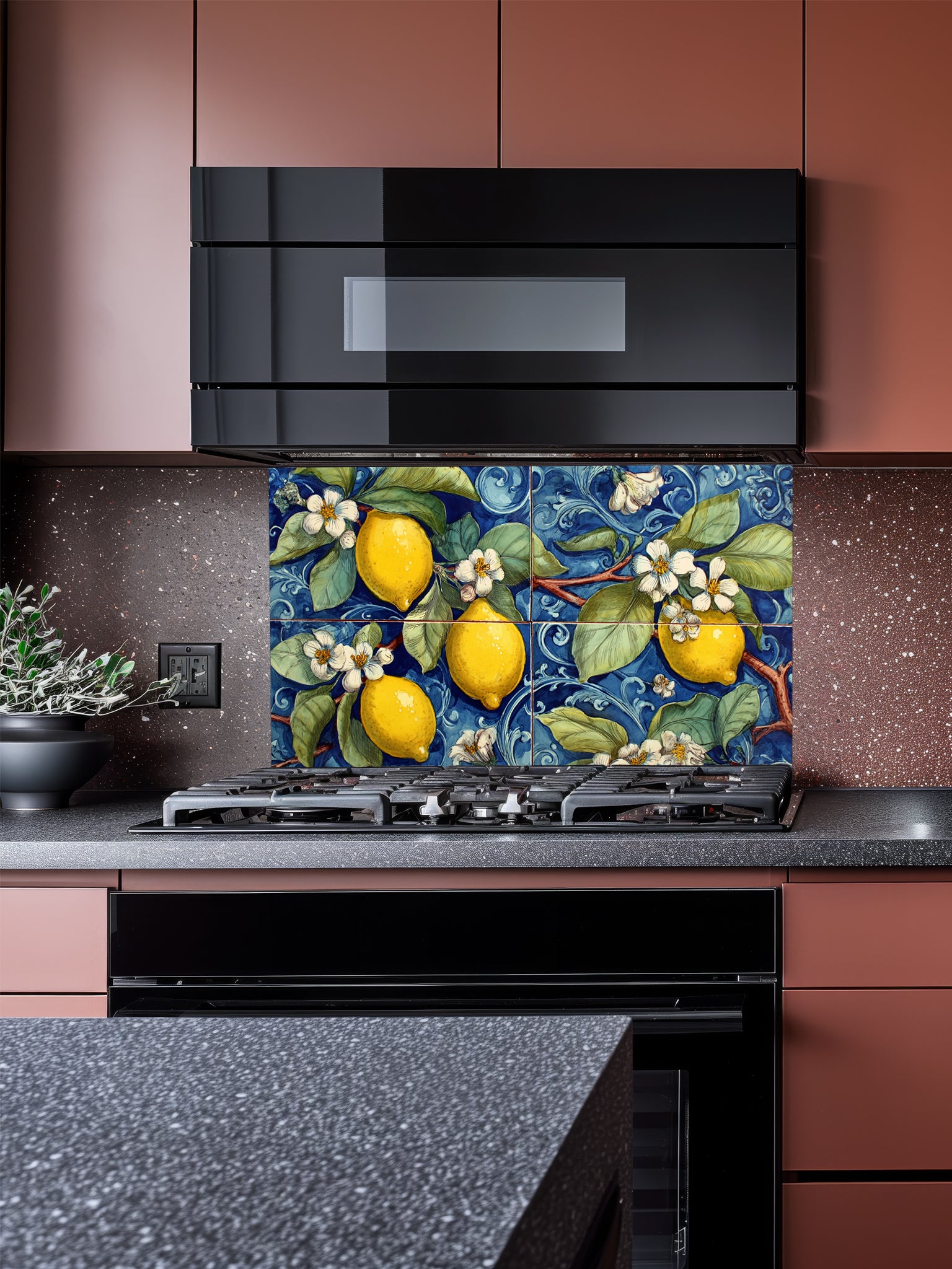 Tempered glass kitchen backsplash featuring a highly realistic illusion of a large four-panel traditional hand-painted Italian Majolica ceramic tile mural, showcasing bright yellow lemons and white blossoms against a deep cobalt blue background with intricate scrollwork, installed behind a modern black stove.