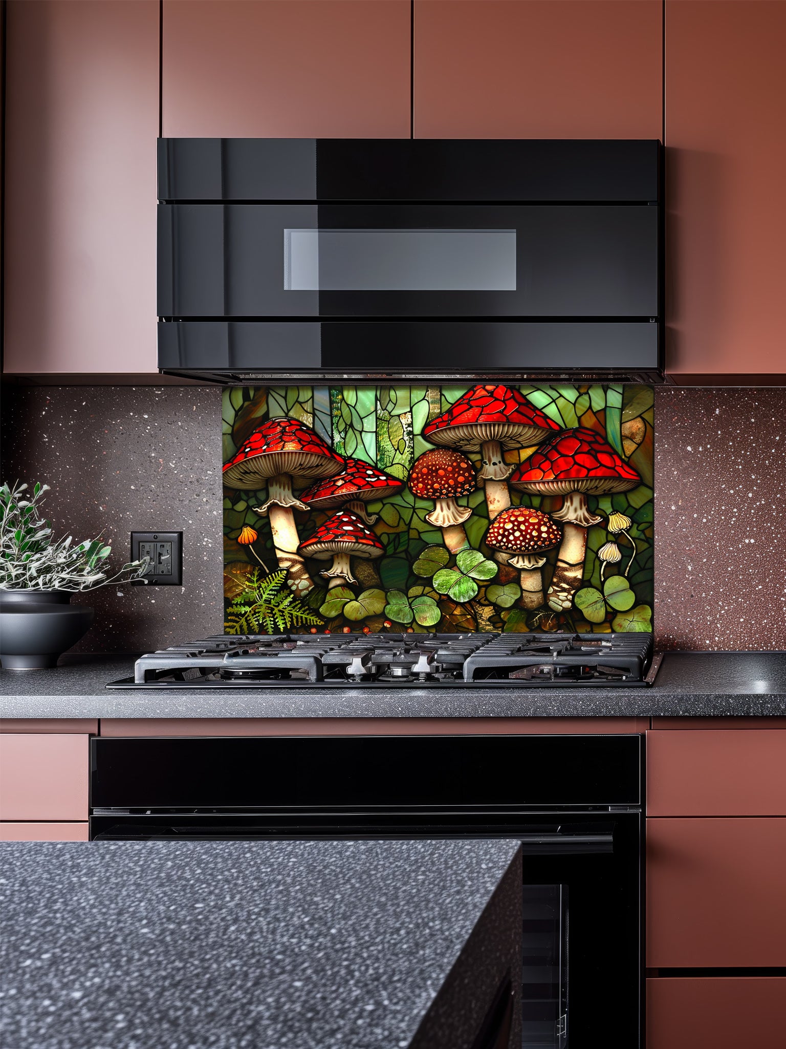 Stained glass style woodland scene with vibrant red mushrooms, ferns, and clovers, UV printed on a smooth tempered glass kitchen backsplash, installed behind a modern stove.
