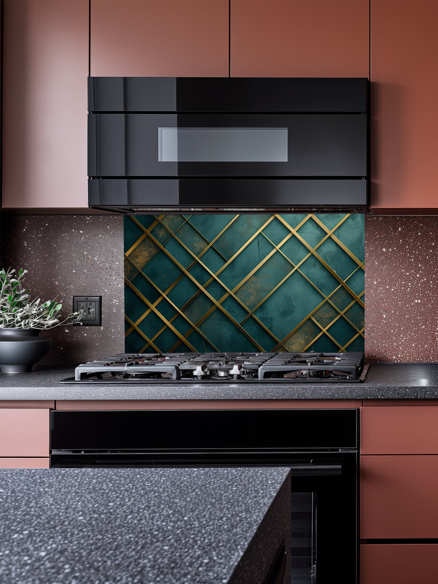 Tempered glass kitchen backsplash featuring a highly realistic 3D illusion of a textured emerald green and teal background crossed by elegant, abstract metallic gold geometric lines, installed behind a modern black stove.