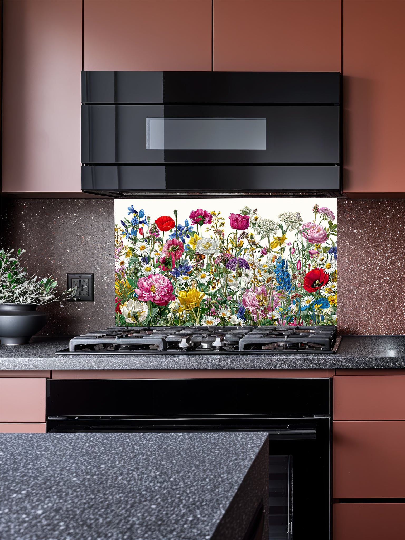 Vibrant spring meadow pattern featuring colorful wildflowers, red poppies, and daisies on a crisp white background, UV printed on a smooth tempered glass kitchen backsplash.