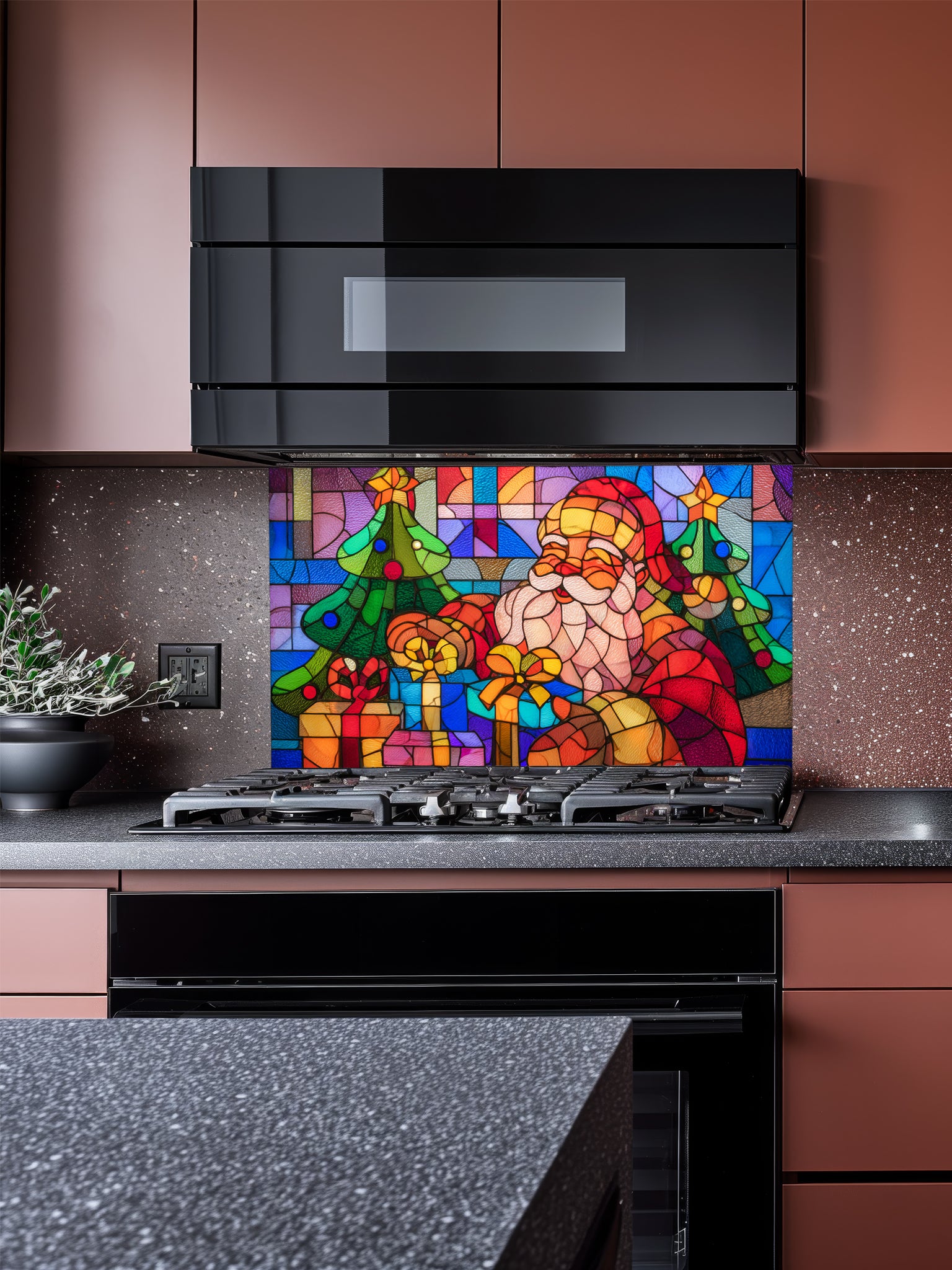 Tempered glass kitchen backsplash featuring a highly realistic 3D illusion of colorful stained glass art showing a cheerful Santa Claus surrounded by green Christmas trees and wrapped gifts in vibrant red, blue, green, and gold, installed behind a modern black stove.