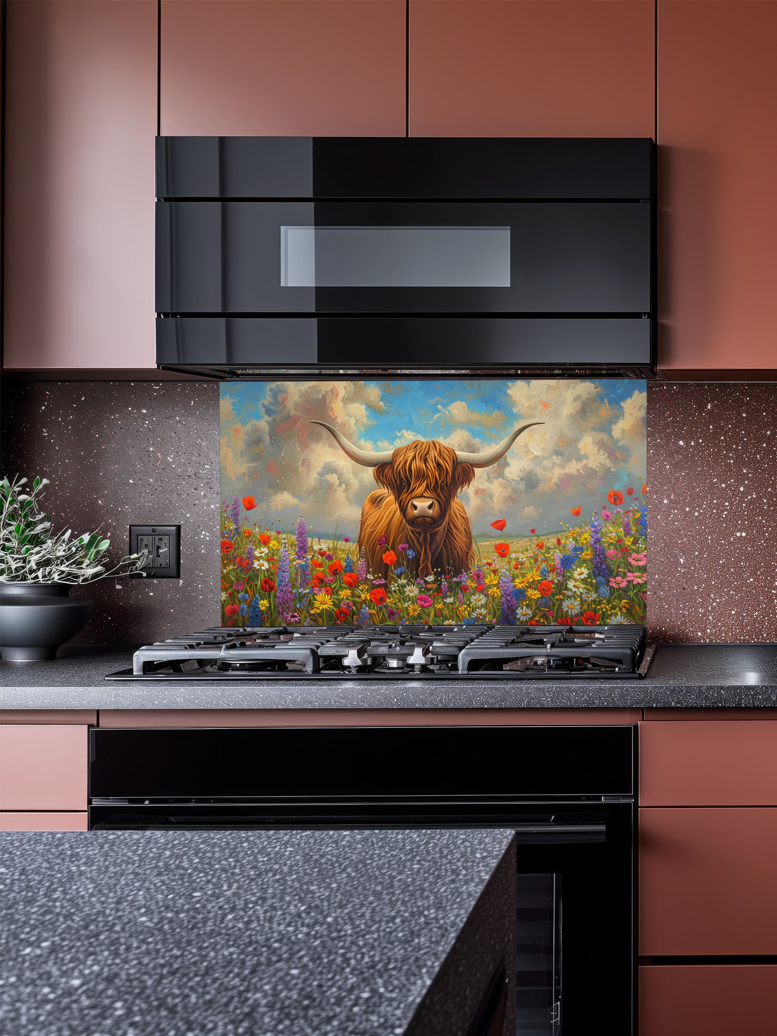 Tempered glass kitchen backsplash featuring a highly realistic 3D illusion of an oil painting showing a majestic brown Highland cow standing in a vibrant meadow of red, purple, and yellow wildflowers under a cloudy sky, installed behind a modern black stove.