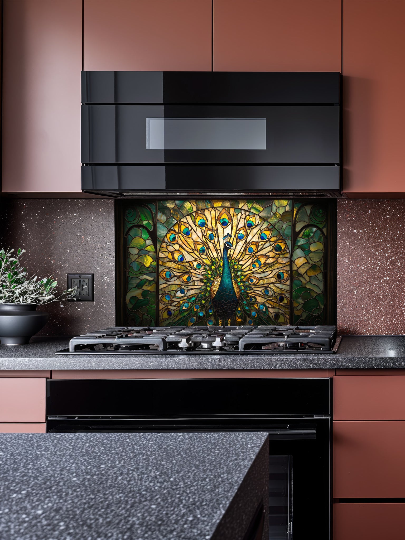 Tempered glass kitchen backsplash featuring a highly realistic 3D illusion of stained glass art showing a majestic peacock with fully spread tail feathers in vibrant emerald greens, blues, and gold, installed behind a modern stainless steel stove.