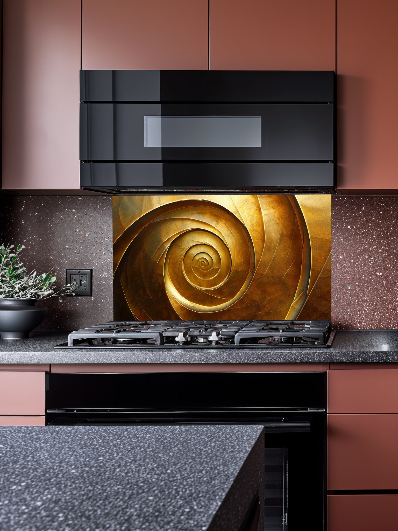 Tempered glass kitchen backsplash featuring a highly realistic 3D illusion of an abstract metallic golden spiral or vortex with deep shadows and glowing bronze highlights, installed behind a modern black stove.