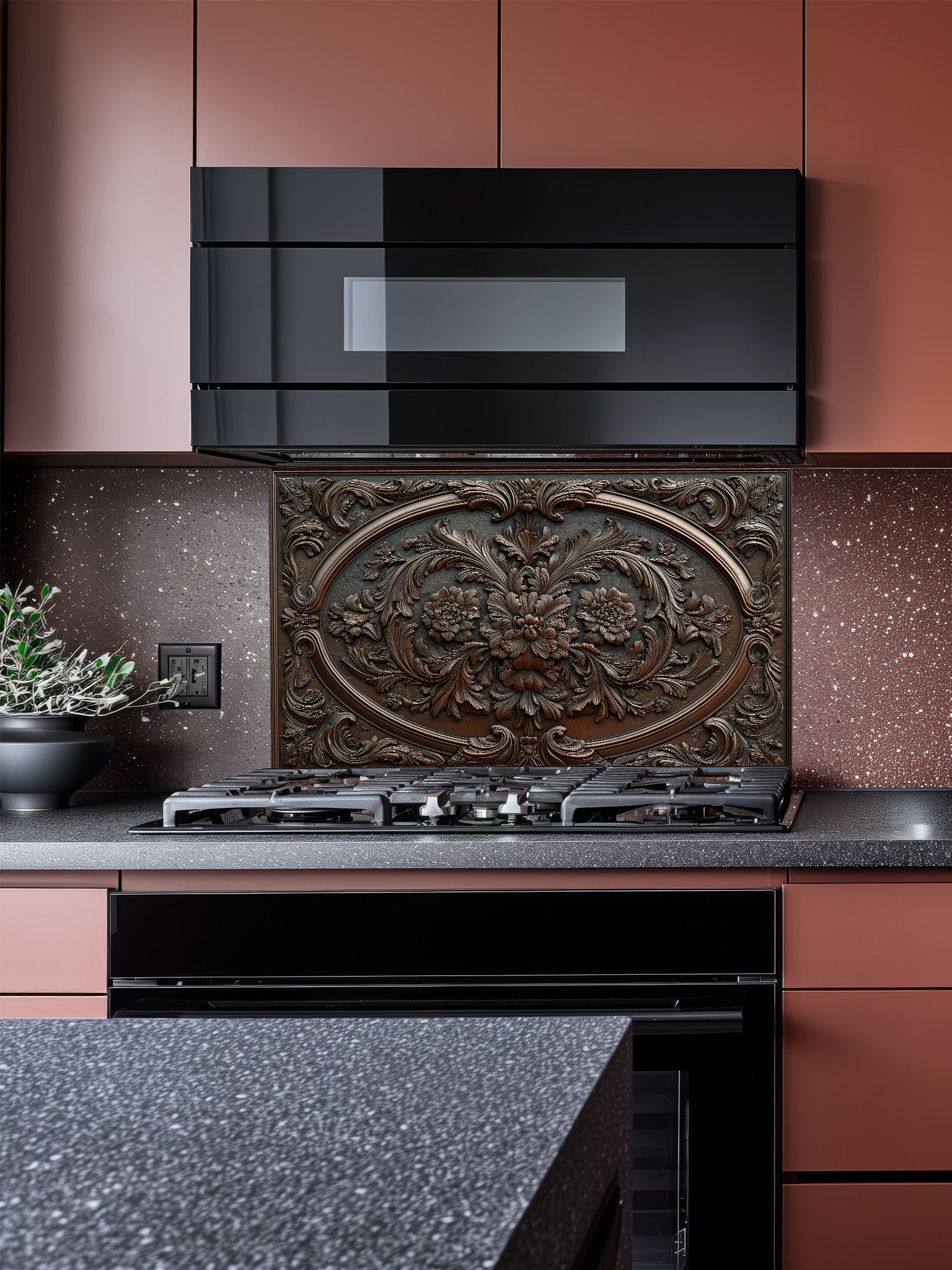 Faux 3D effect dark wood carved floral pattern in an ornate baroque frame, UV printed on a smooth tempered glass kitchen backsplash, installed behind a modern stove.