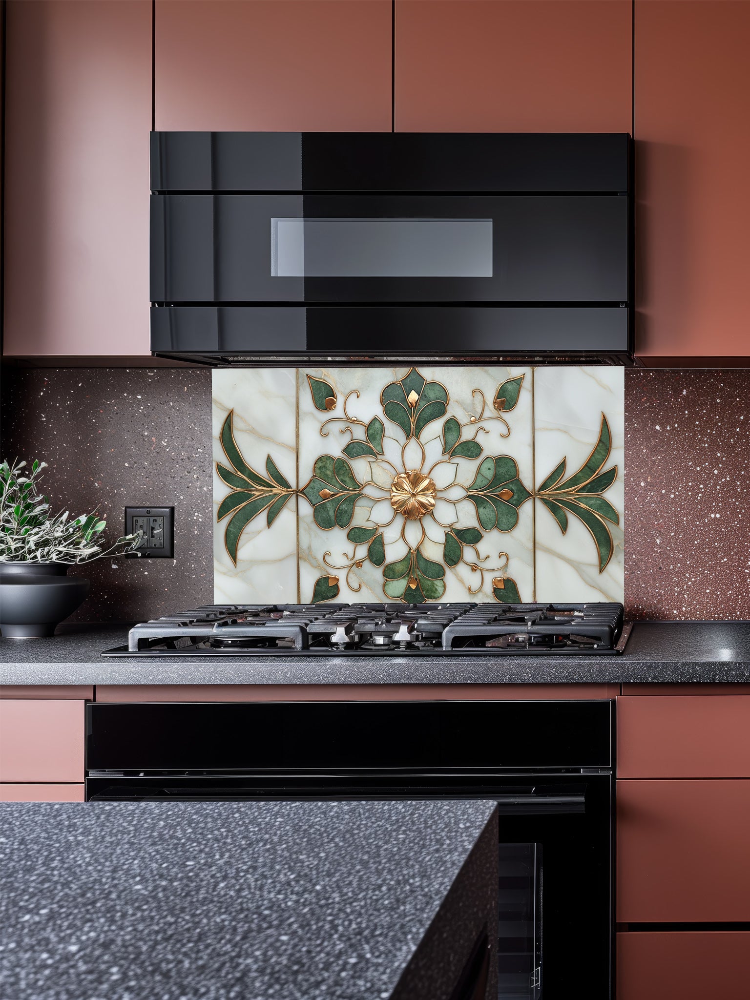 A luxurious kitchen featuring a tempered glass backsplash with a white marble background, symmetrical green floral leaves, and 3D-effect gold accents, installed behind a modern stainless steel stove.