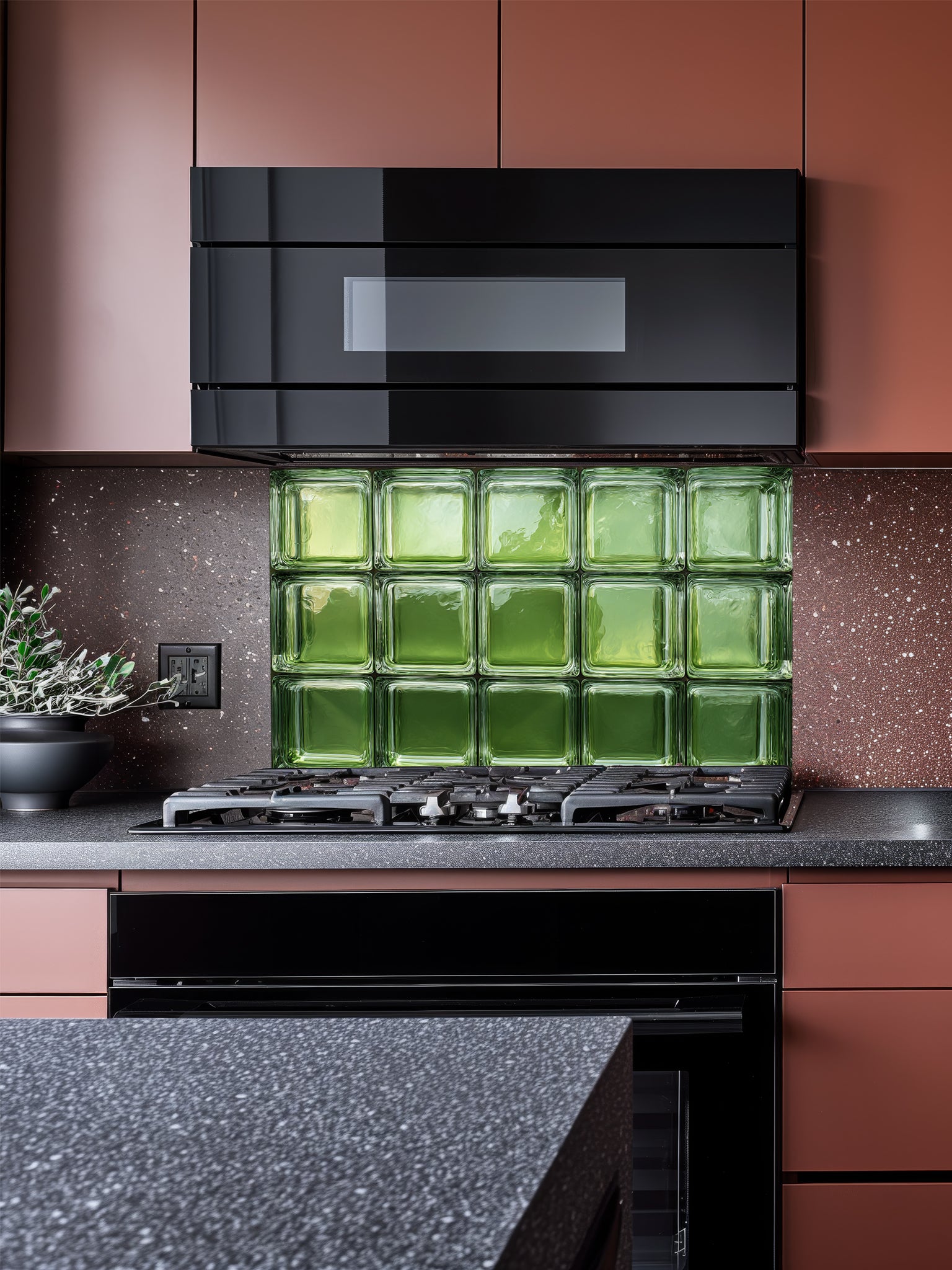 Tempered glass kitchen backsplash featuring a highly realistic 3D illusion of architectural glass blocks in vibrant translucent vintage green with authentic wavy textures, installed behind a modern black stove.