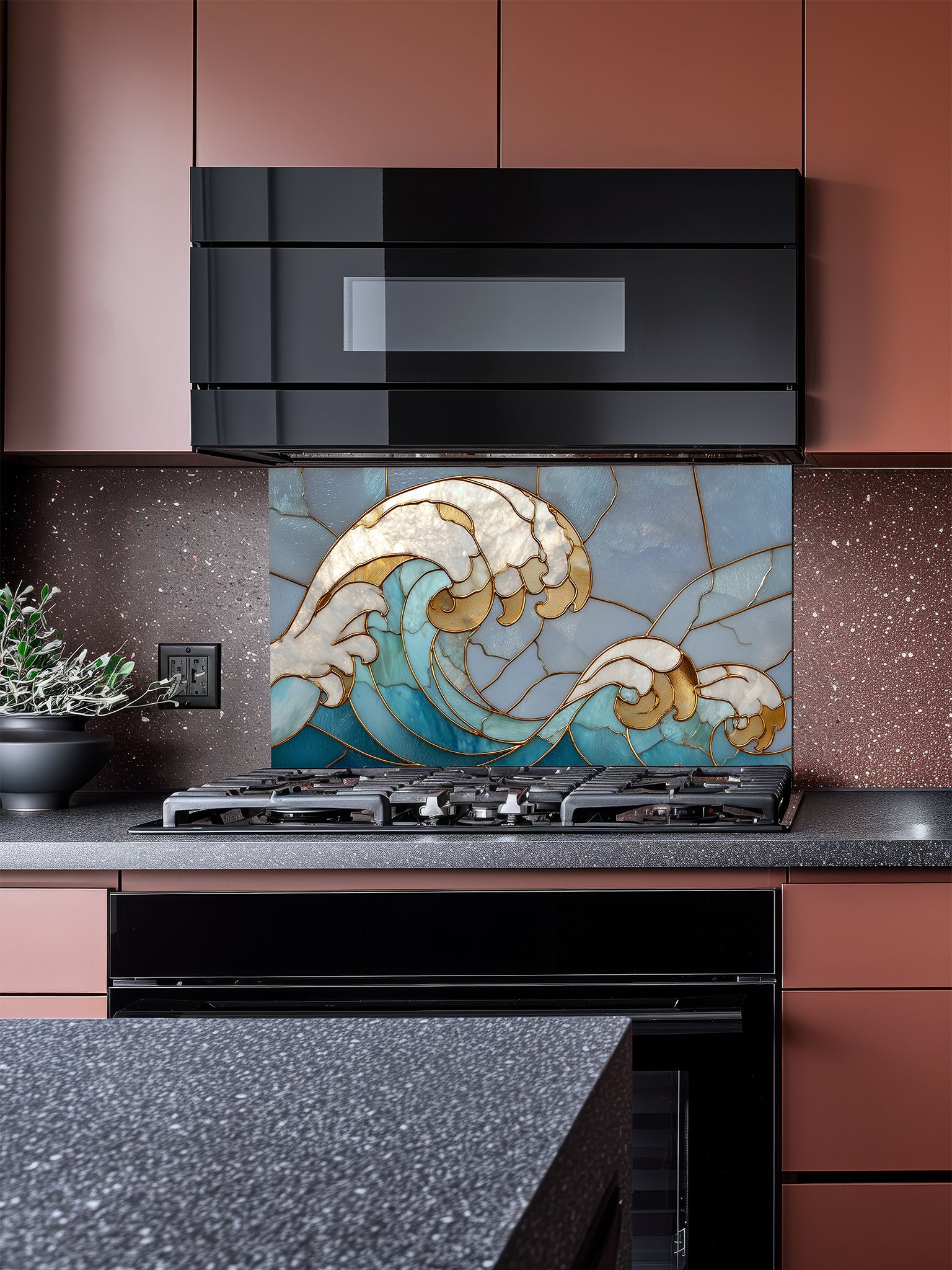 Tempered glass kitchen backsplash featuring a dramatic crashing ocean wave design in faux stained glass with deep blue water, white foam crests, and elegant gold outlines, installed behind a modern stainless steel stove.
