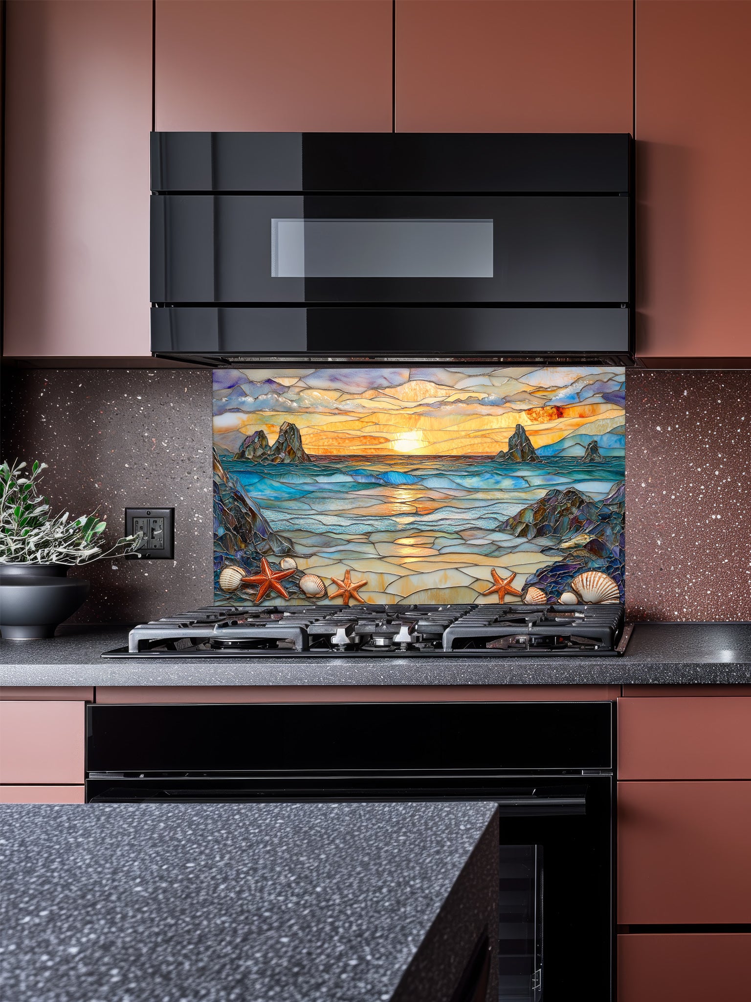 Stained glass style beach sunset with ocean waves, rocky cliffs, seashells, and starfish, UV printed on a smooth tempered glass kitchen backsplash, installed behind a modern stove.