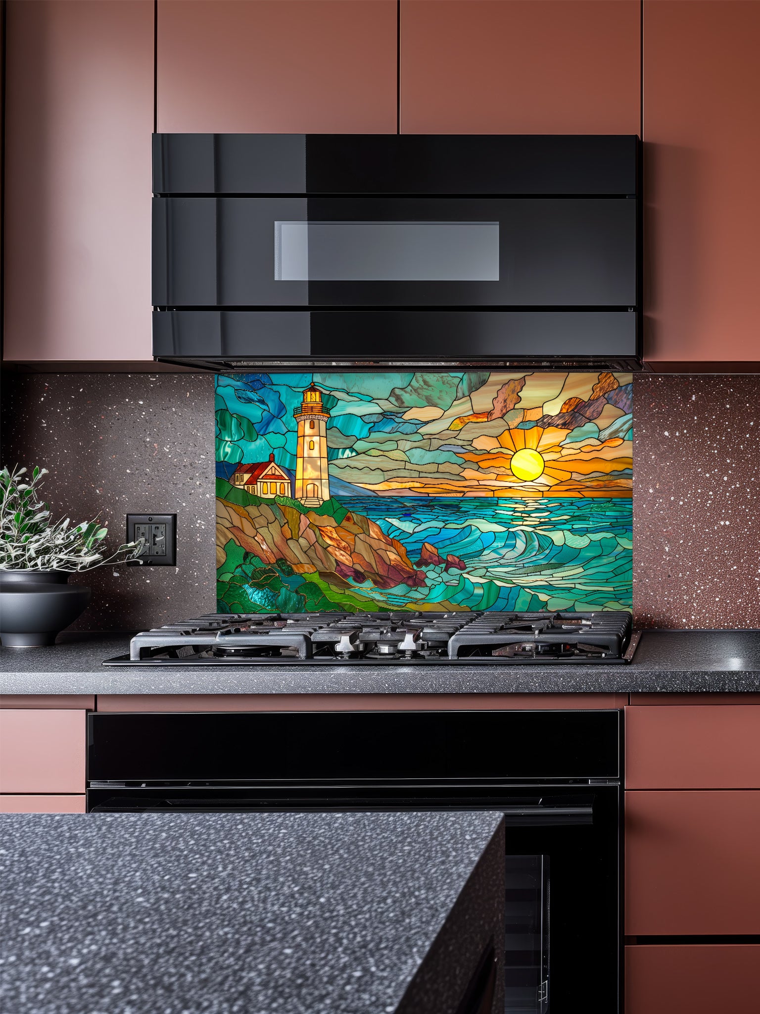 Stained glass style coastal landscape with a lighthouse on a rocky cliff and a vibrant ocean sunset, UV printed on a smooth tempered glass kitchen backsplash, installed behind a modern stove.