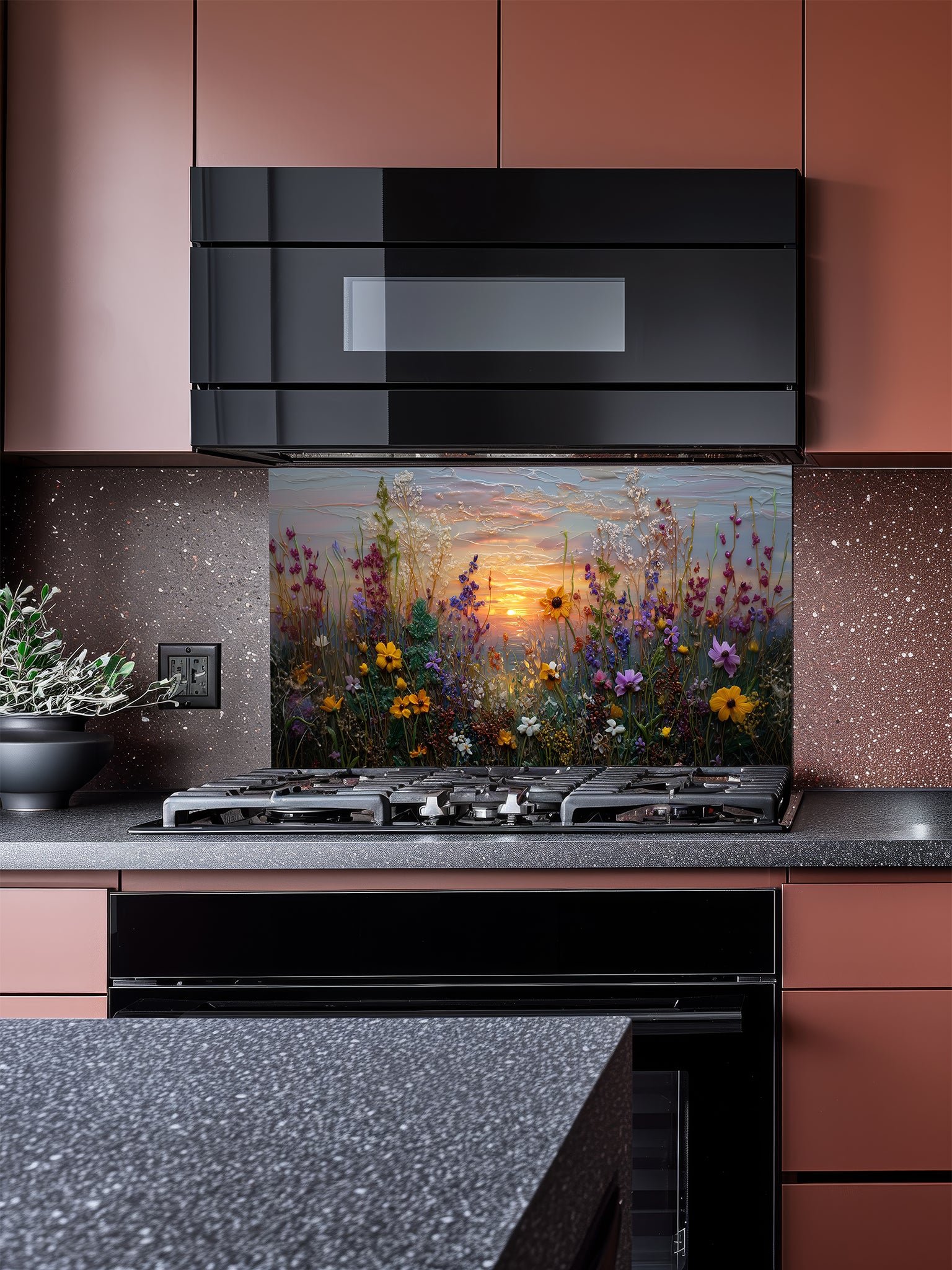 Tempered glass kitchen backsplash featuring a highly realistic 3D illusion of an impasto oil painting showing a vibrant wildflower meadow against a soft pastel sunset sky, installed behind a modern stainless steel stove.