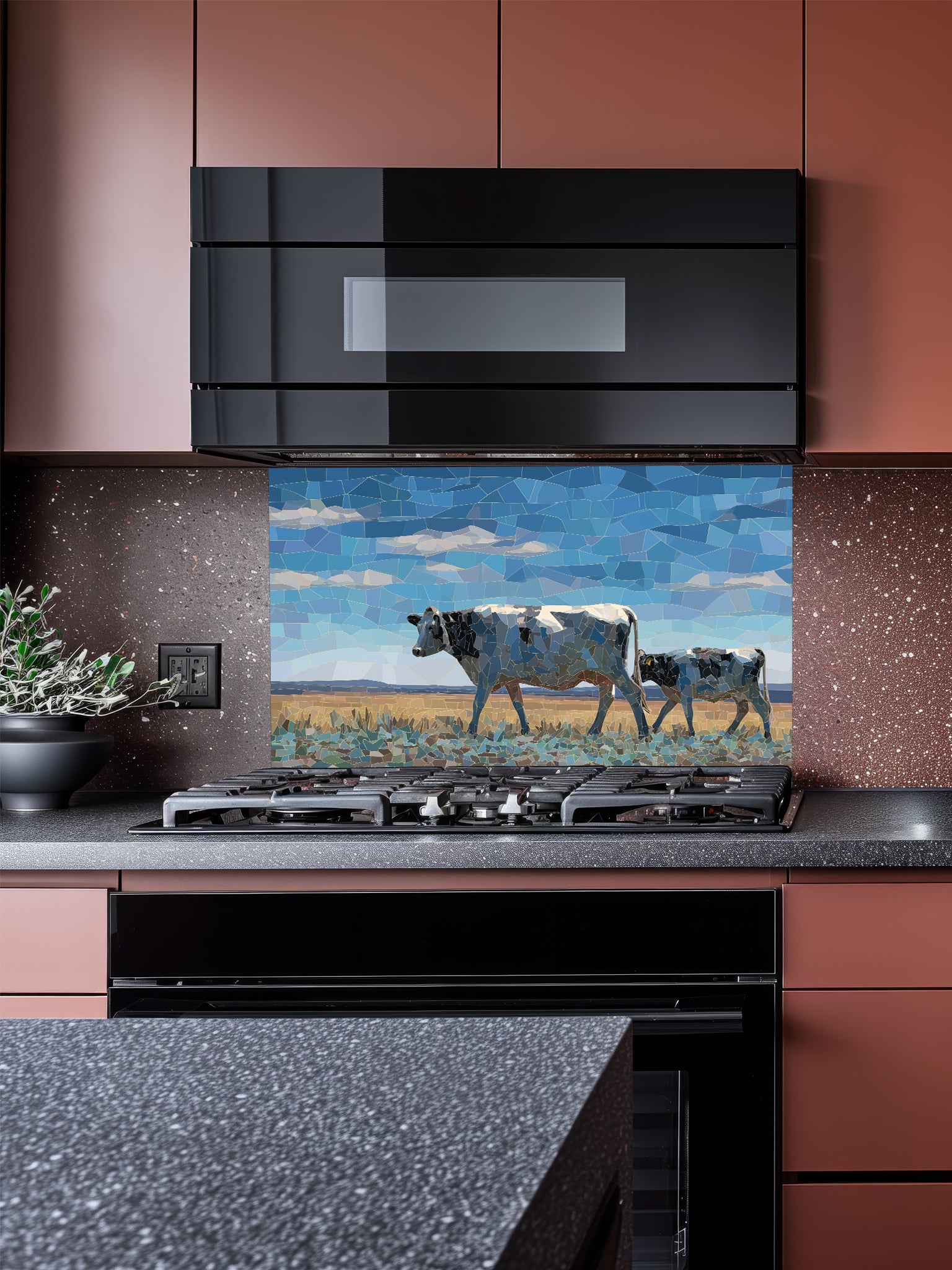 Faux mosaic tile art of a cow and calf in a pasture under a blue sky, UV printed on a smooth tempered glass kitchen backsplash, installed behind a modern stove.