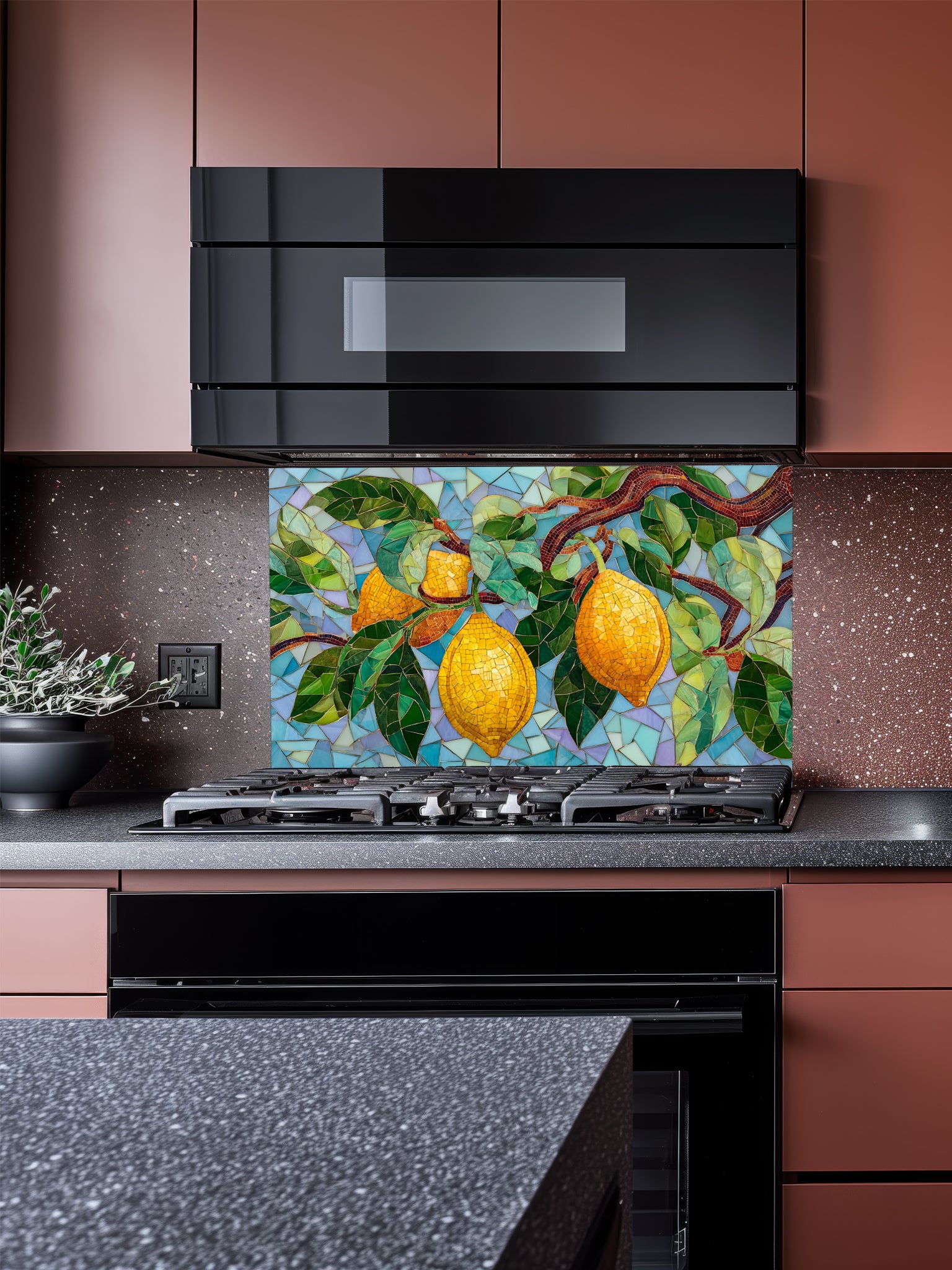 Tempered glass kitchen backsplash featuring a highly realistic 3D illusion of mosaic tile art showing bright yellow lemons and lush green leaves on a branch against a multi-toned light blue and teal mosaic background, installed behind a modern black stove.
