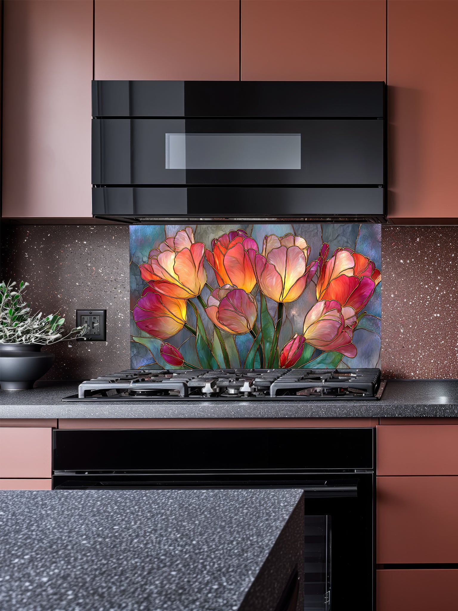 Stained glass style blooming tulips in vibrant red, orange, yellow, and pink on a textured blue background, UV printed on a smooth tempered glass kitchen backsplash, installed behind a modern stove.
