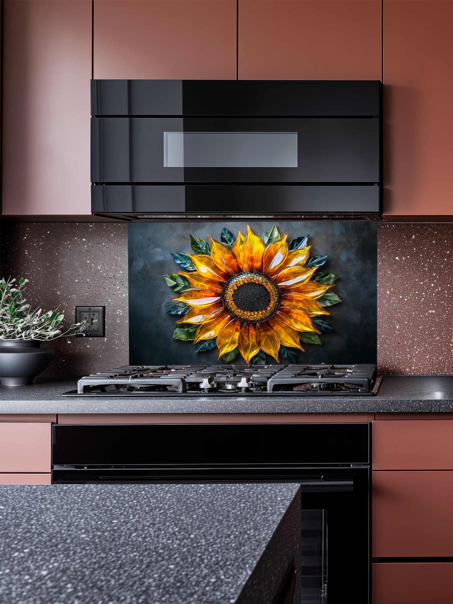 Tempered glass kitchen backsplash featuring a highly realistic 3D illusion of a glowing, translucent blown glass golden sunflower with green leaves against a dramatic dark charcoal background, installed behind a modern stainless steel stove.