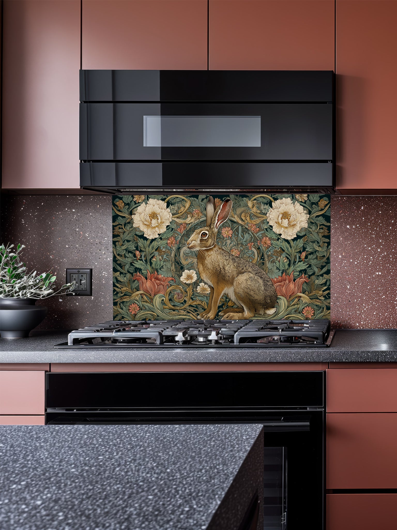 A cozy kitchen featuring a tempered glass backsplash with a vintage botanical illustration of a brown hare surrounded by moody, tapestry-style florals, installed behind a modern stainless steel stove.