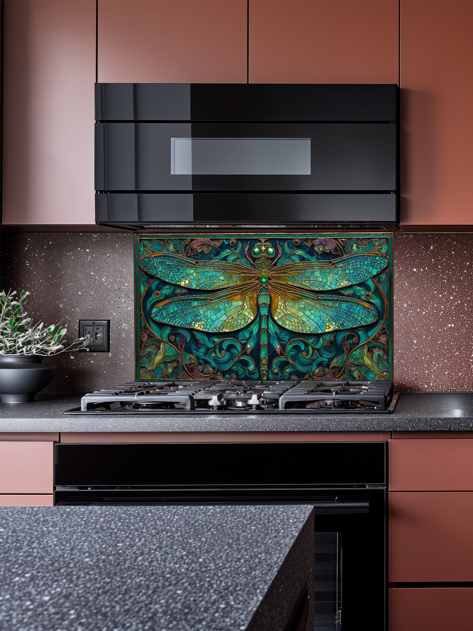 Tempered glass kitchen backsplash featuring a highly realistic 3D illusion of Art Nouveau stained glass showing a magnificent dragonfly with intricate teal and emerald green wings outlined in gold, surrounded by botanical swirls, installed behind a modern stainless steel stove.